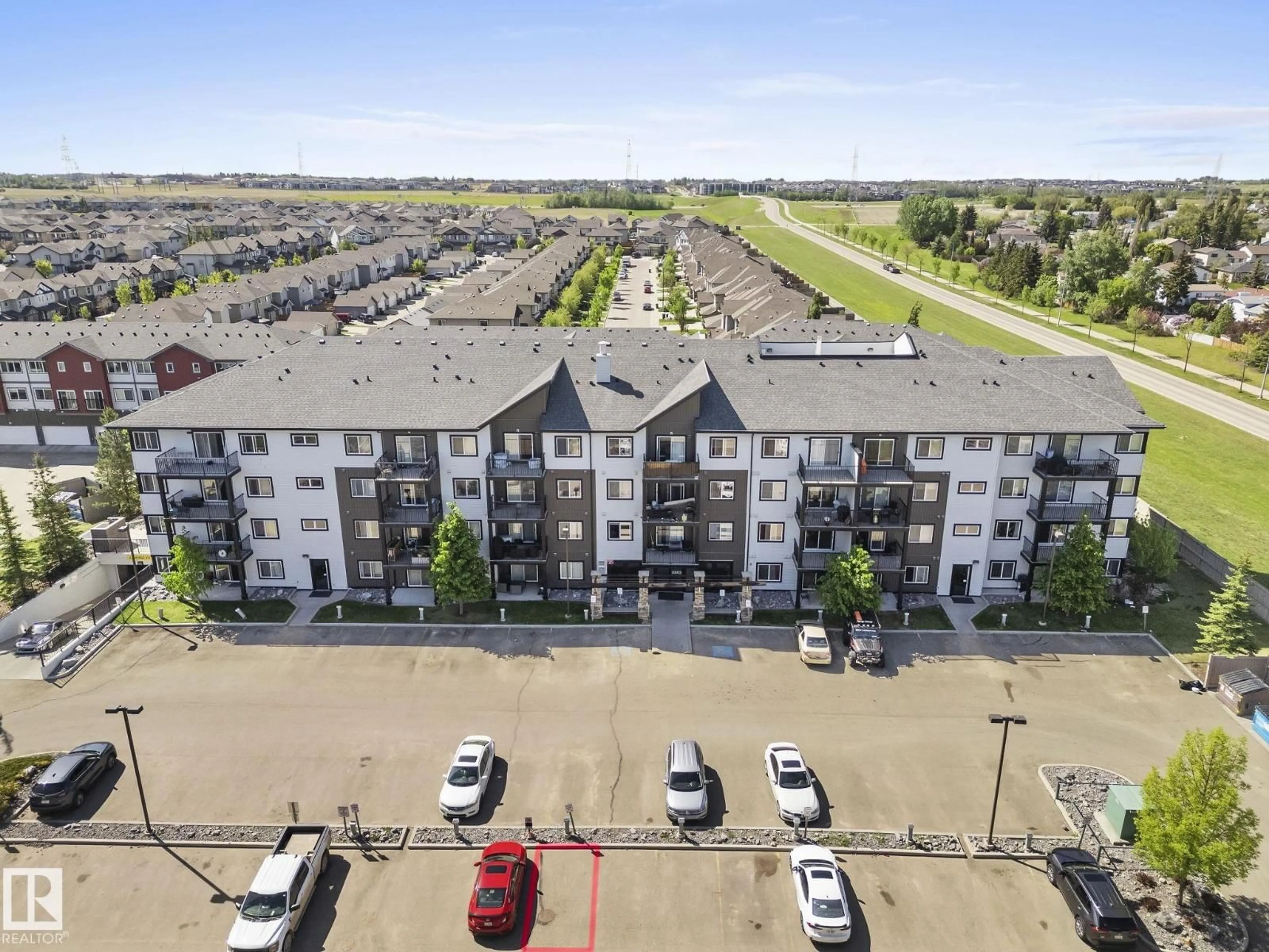 A pic from outside/outdoor area/front of a property/back of a property/a pic from drone, unknown for #306 - 3353 16A AV, Edmonton Alberta T6T0V4