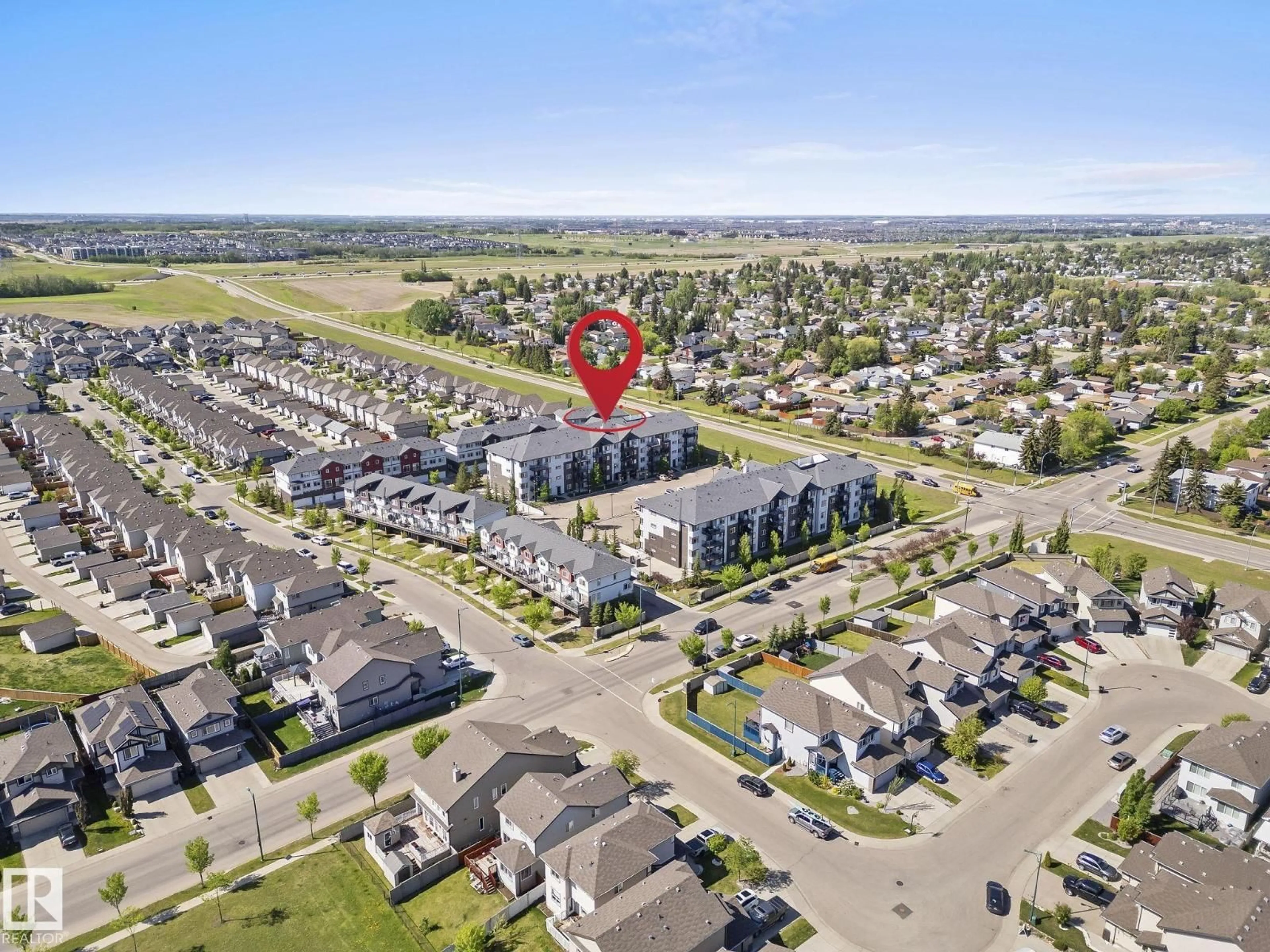 A pic from outside/outdoor area/front of a property/back of a property/a pic from drone, street for #306 - 3353 16A AV, Edmonton Alberta T6T0V4