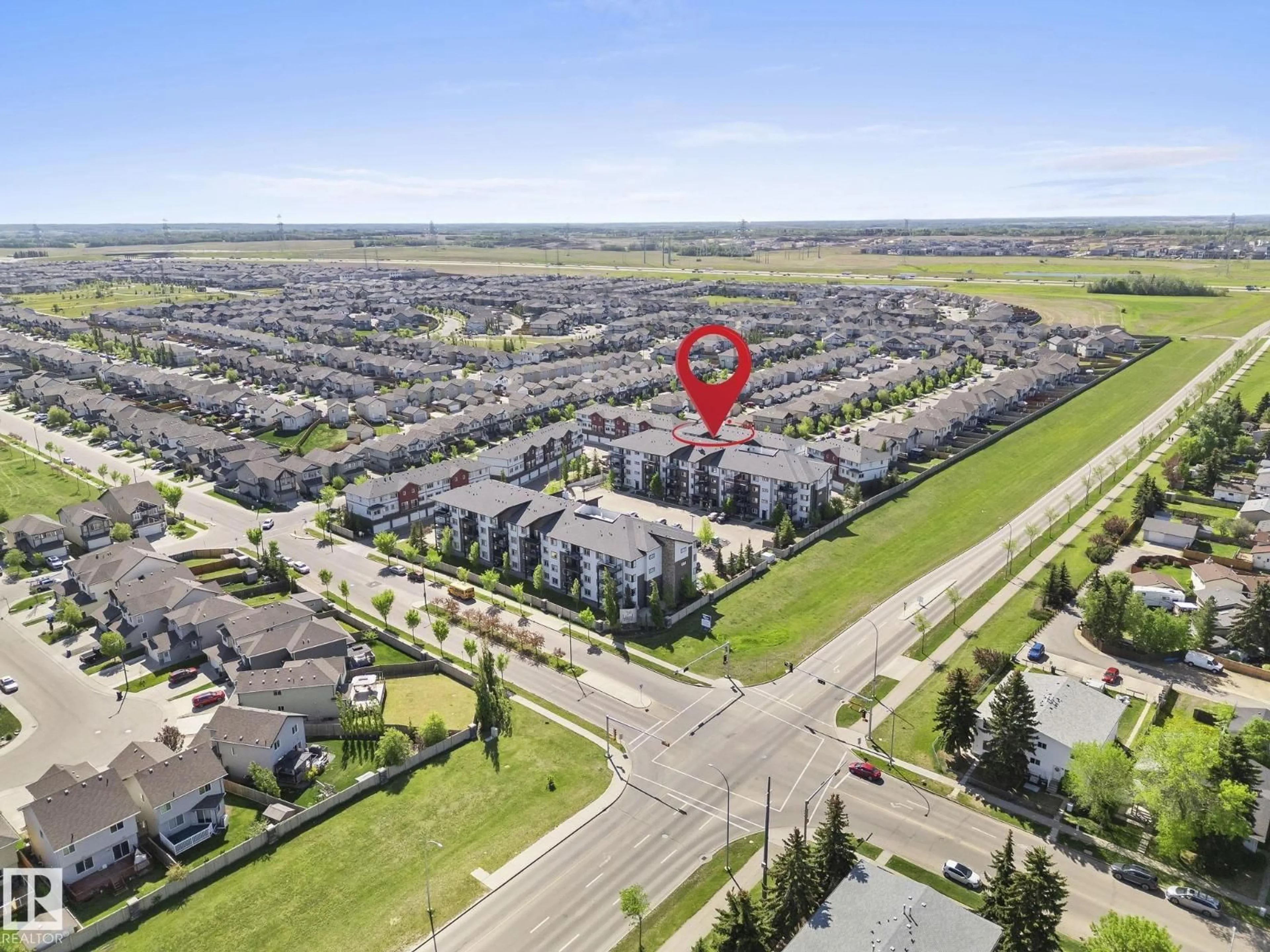 A pic from outside/outdoor area/front of a property/back of a property/a pic from drone, street for #306 - 3353 16A AV, Edmonton Alberta T6T0V4
