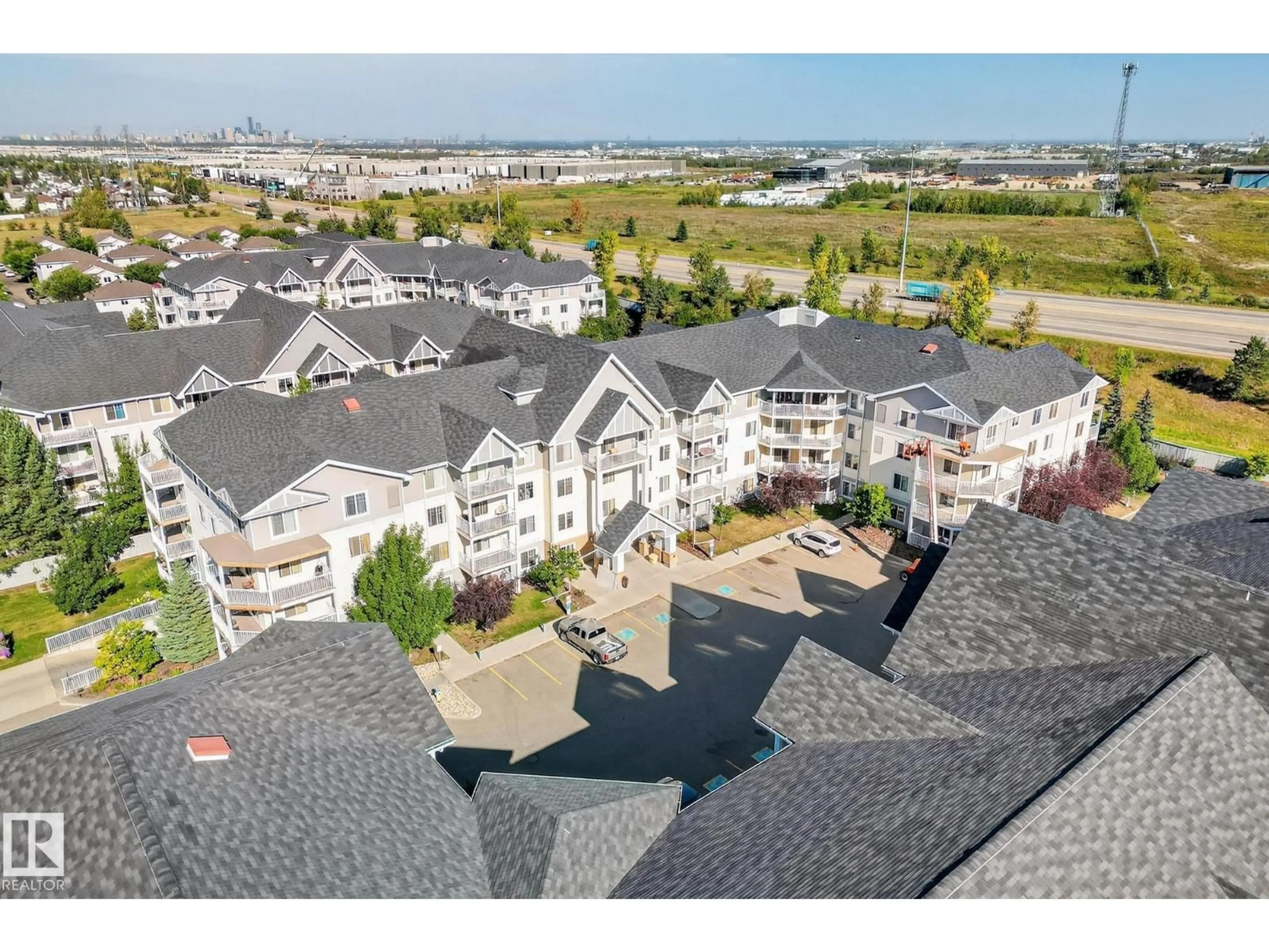 A pic from outside/outdoor area/front of a property/back of a property/a pic from drone, city buildings view from balcony for #215 - 2208 44 AV NW, Edmonton Alberta T6T0G6