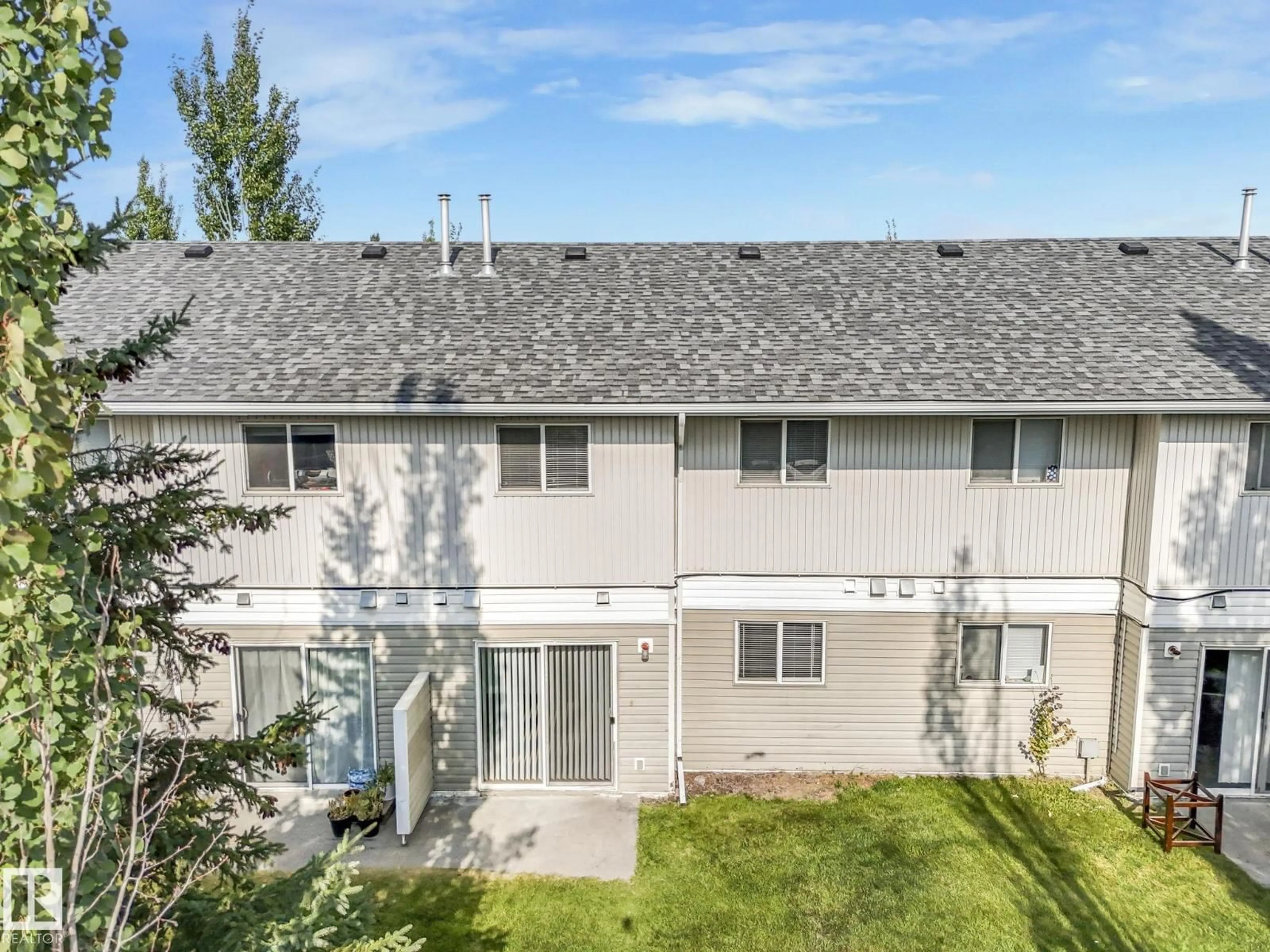 A pic from outside/outdoor area/front of a property/back of a property/a pic from drone, mountain view for 166 180 BRIDGEPORT BV, Leduc Alberta T9E8S1
