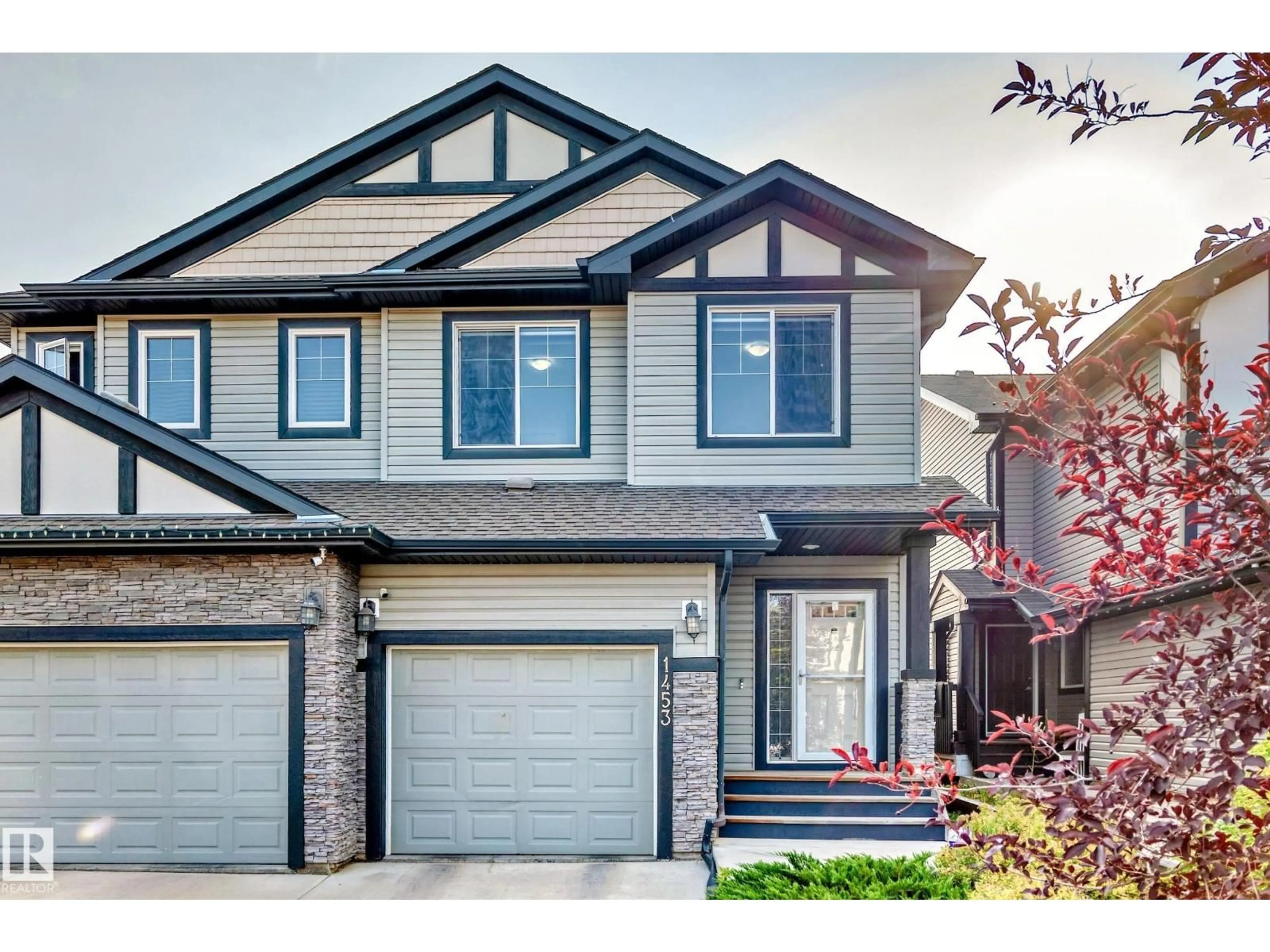 Home with vinyl exterior material, street for 1453 33A ST, Edmonton Alberta T5T0V6