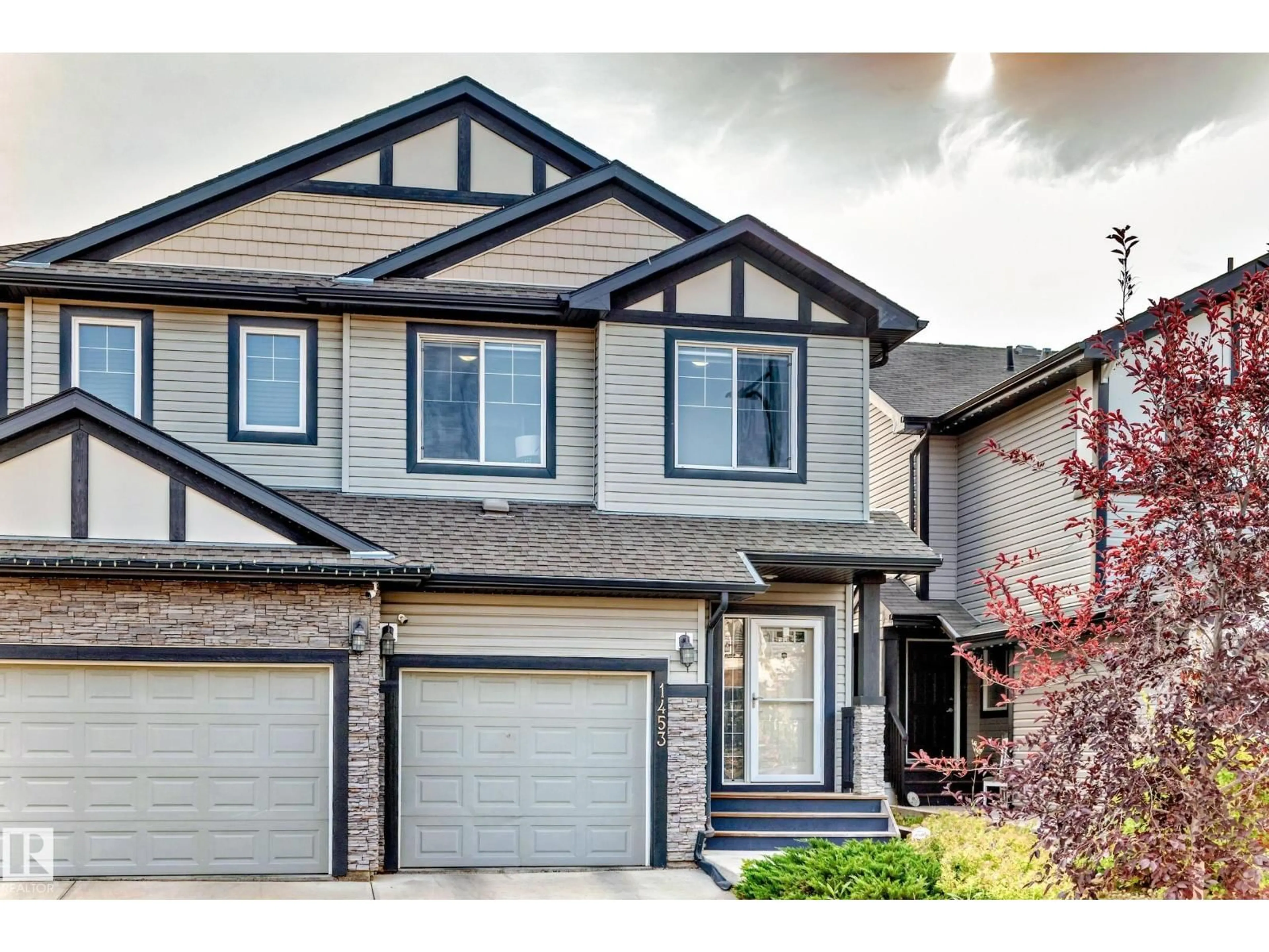 Home with vinyl exterior material, street for 1453 33A ST, Edmonton Alberta T5T0V6