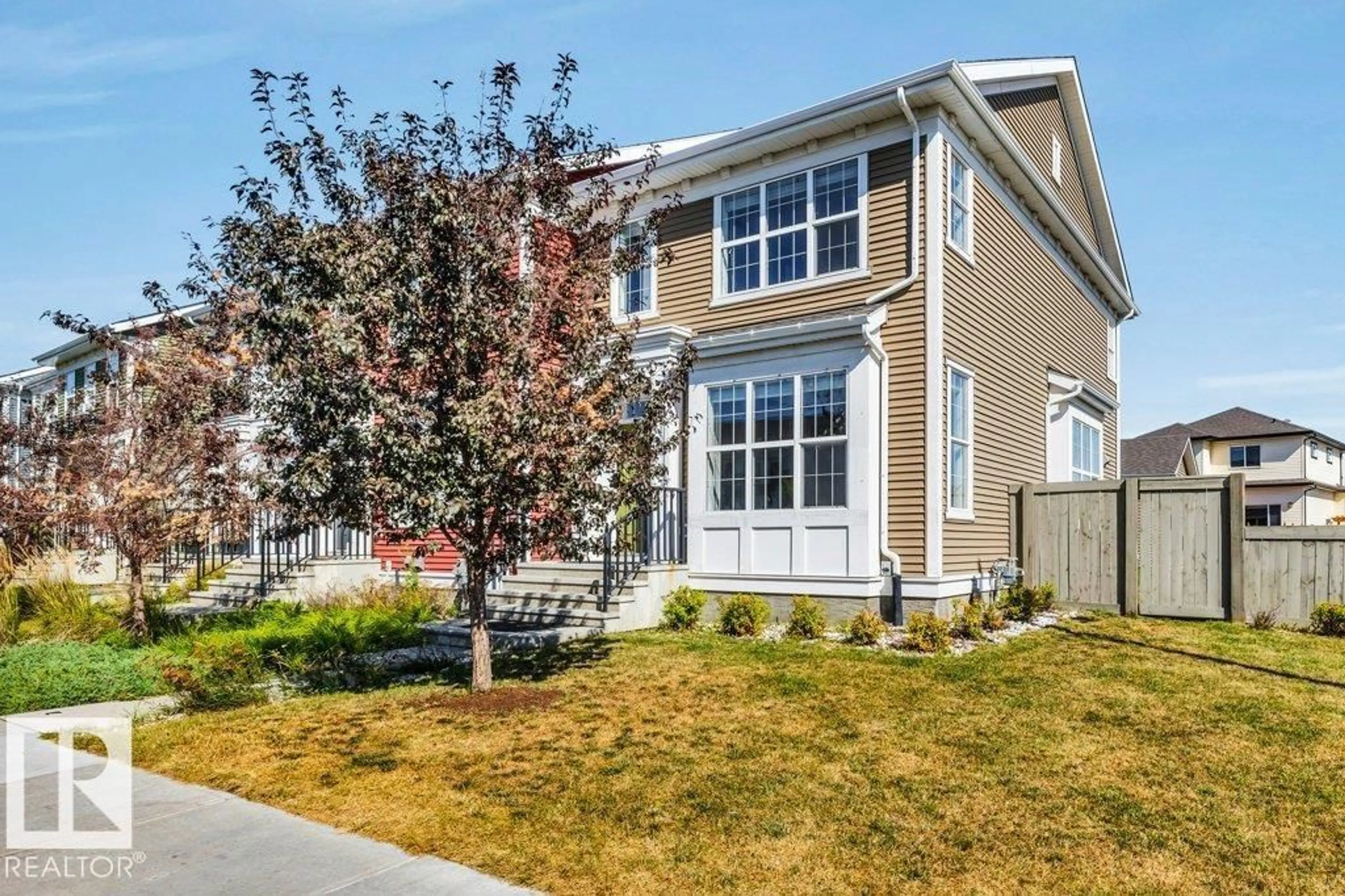Home with vinyl exterior material, street for NW - 2103 24 ST, Edmonton Alberta T6T0Y8