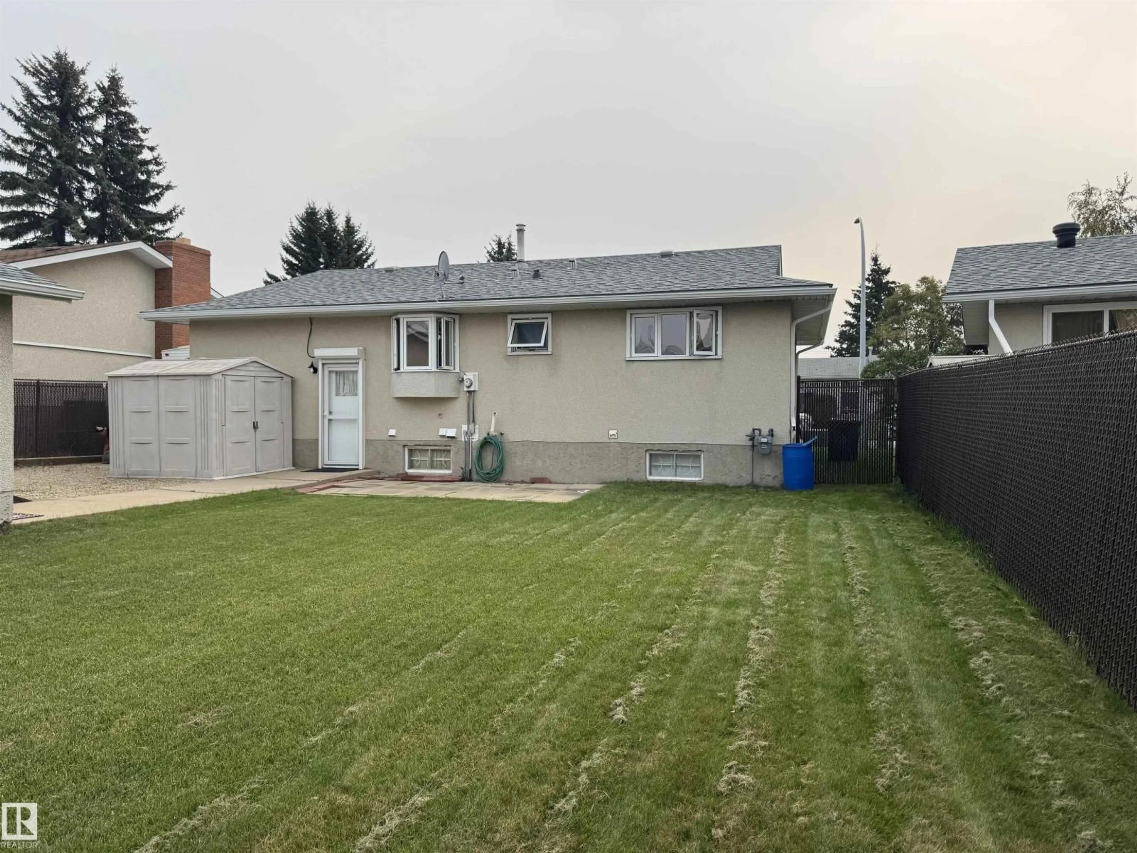 A pic from outside/outdoor area/front of a property/back of a property/a pic from drone, street for 5408 50 ST, Gibbons Alberta T0A1N0
