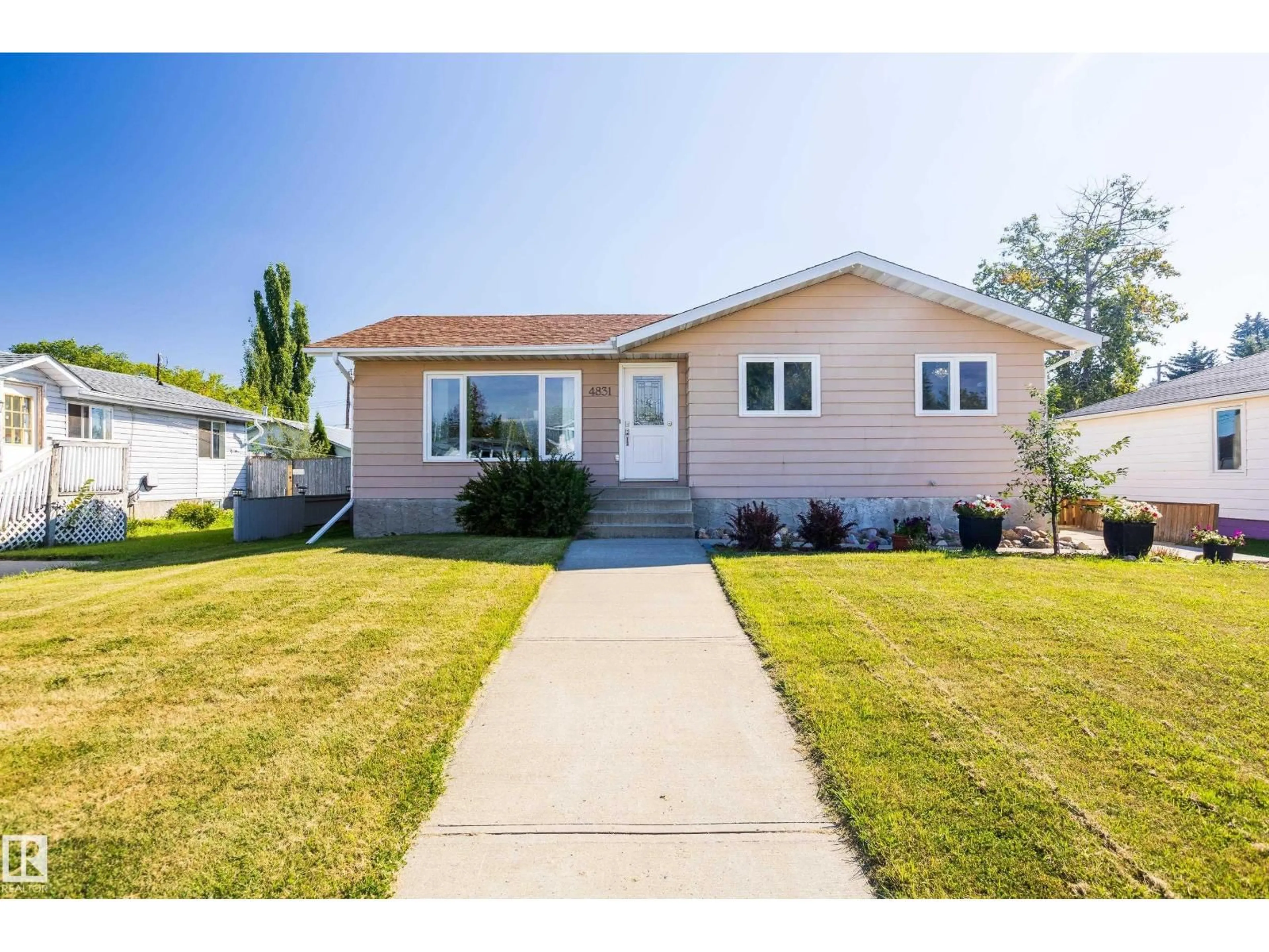 Home with vinyl exterior material, street for 4831 54 ST, Redwater Alberta T0A2W0