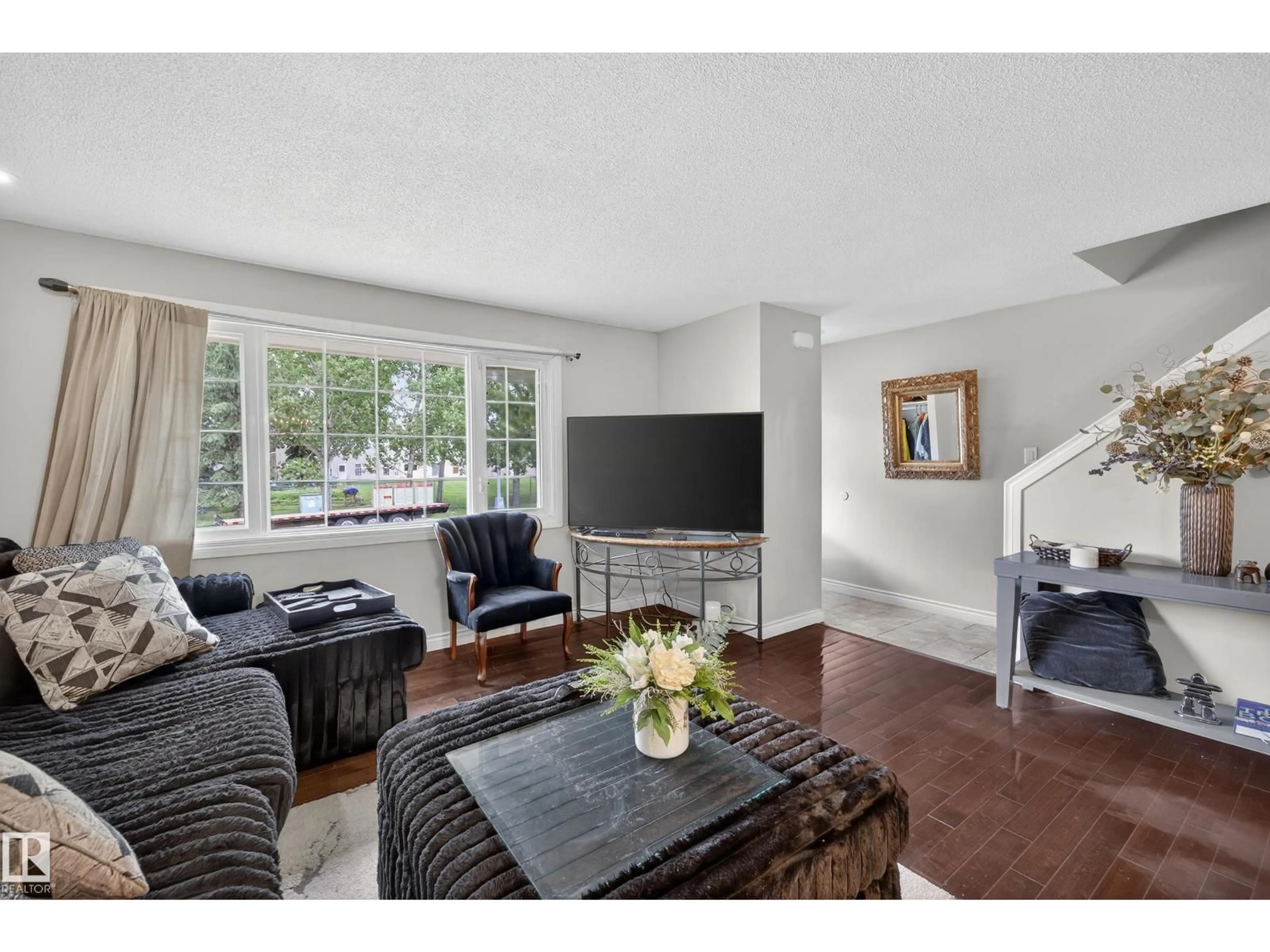 Living room with furniture, unknown for 11447 39 AV, Edmonton Alberta T6J0M5