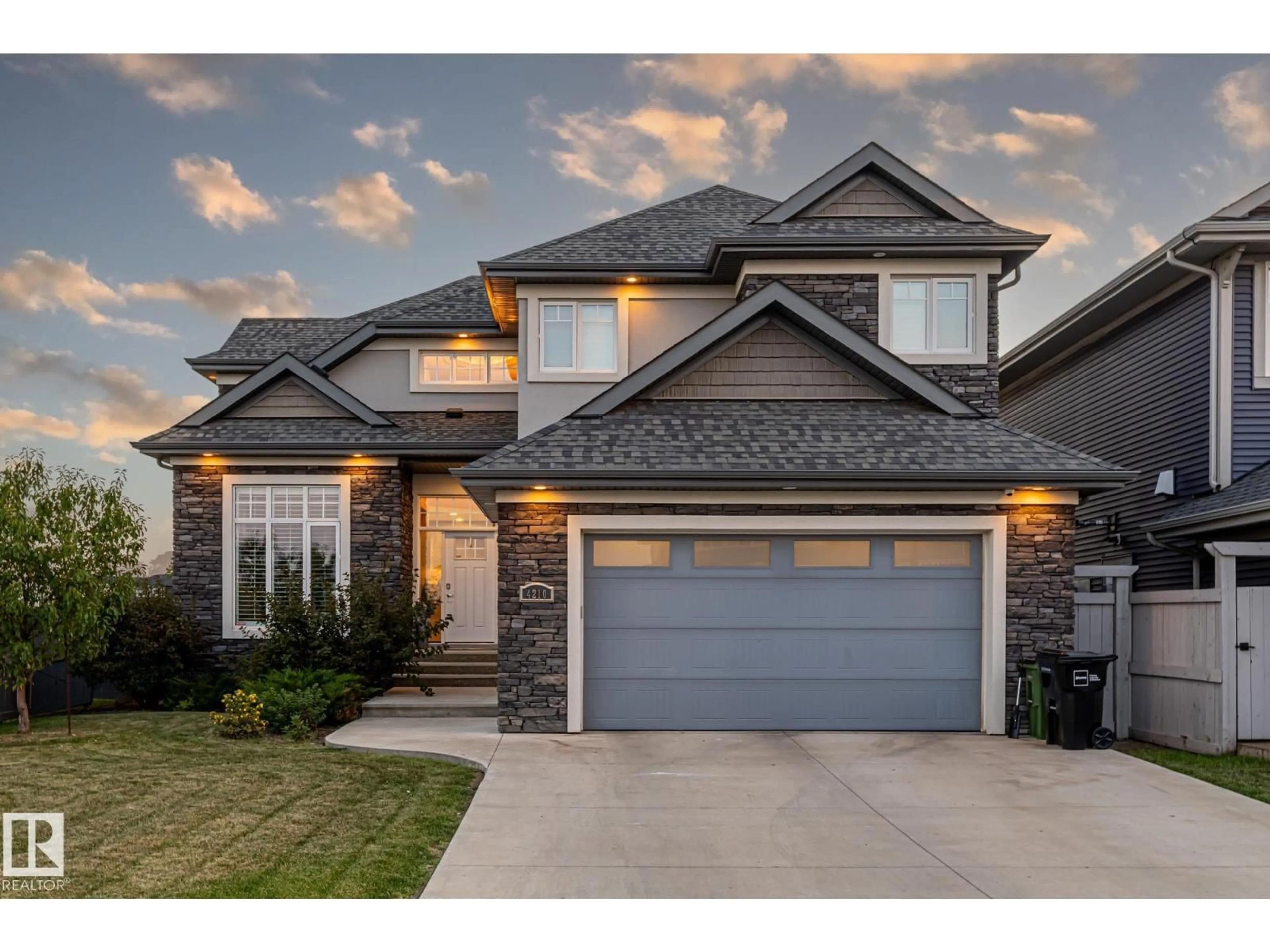 Home with brick exterior material, street for NW NW - 4210 VETERANS WY, Edmonton Alberta T5E6W7