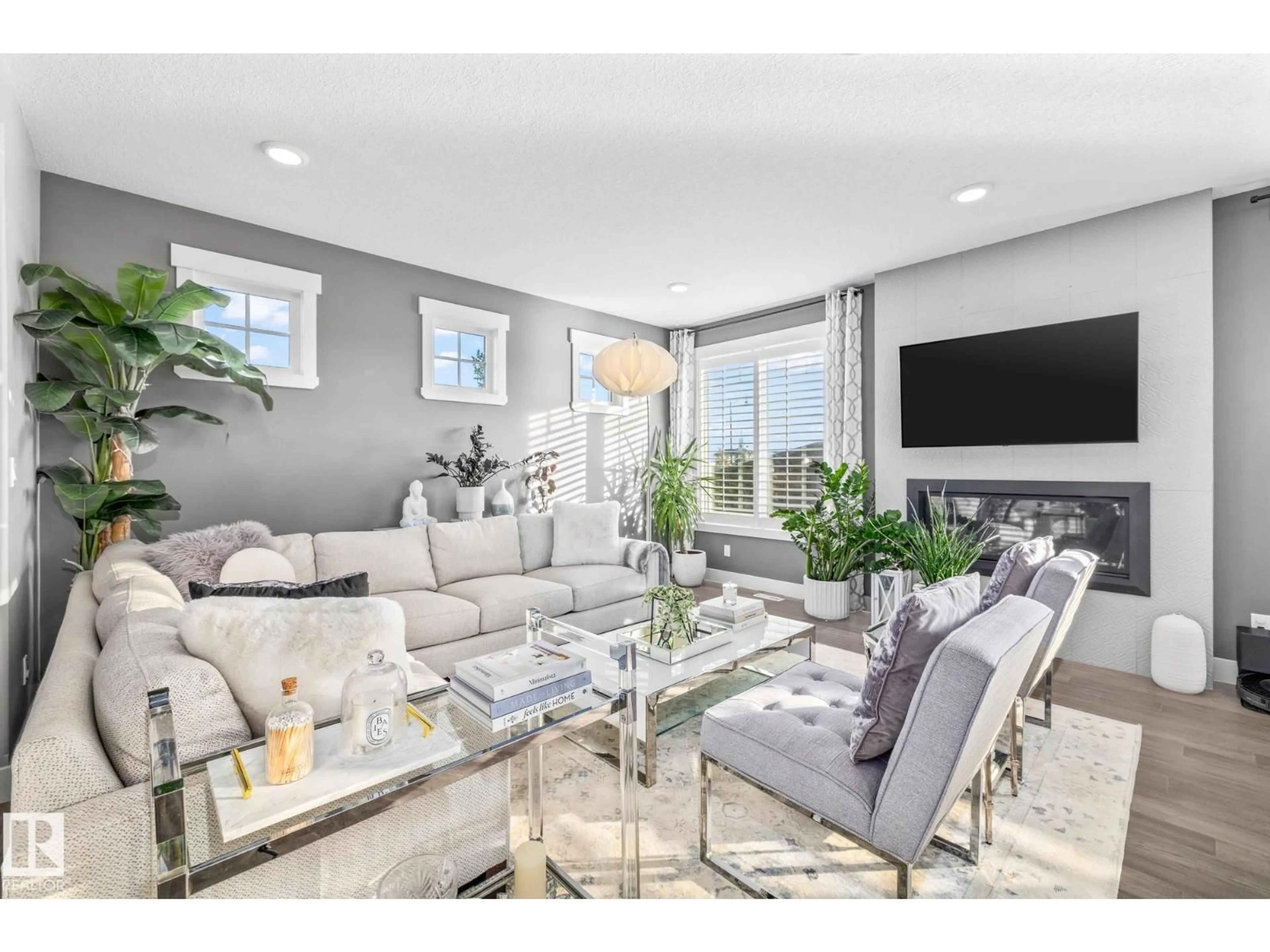 Living room with furniture, unknown for NW NW - 4210 VETERANS WY, Edmonton Alberta T5E6W7
