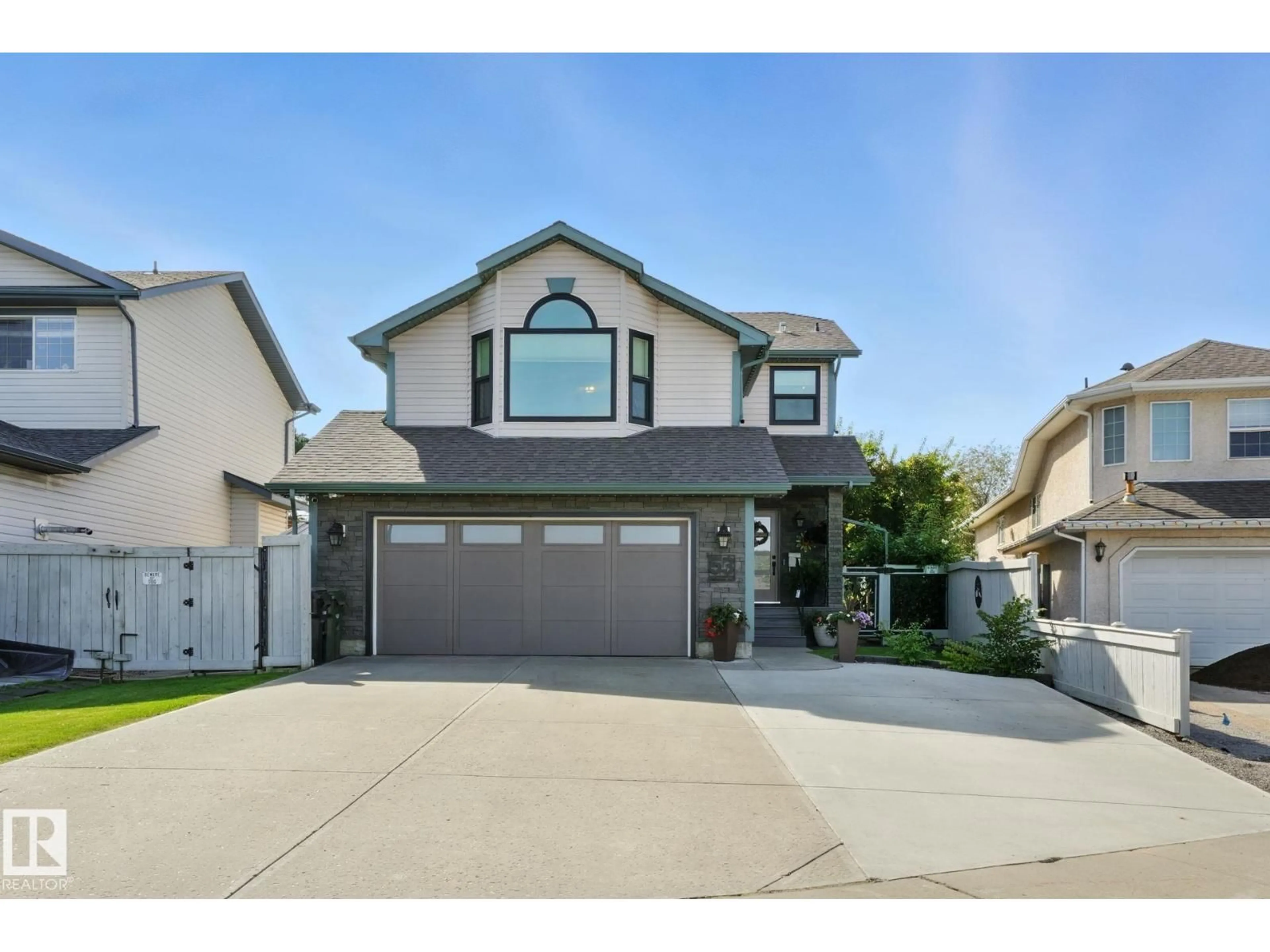 Home with vinyl exterior material, street for 53 CREEKSIDE WY, Spruce Grove Alberta T7X4A2