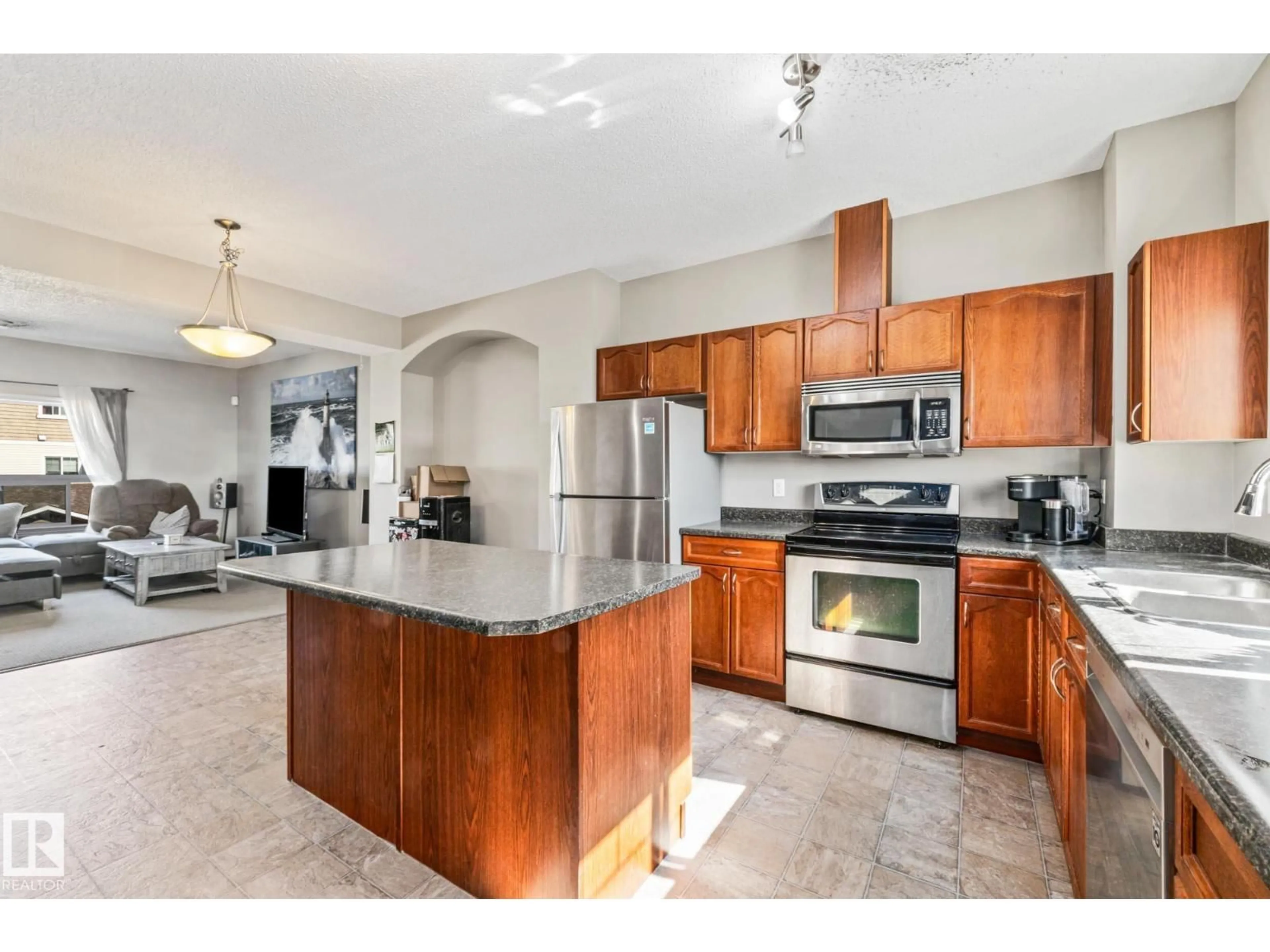 Open concept kitchen, ceramic/tile floor for #4 - 3010 33 AV, Edmonton Alberta T6T0C3