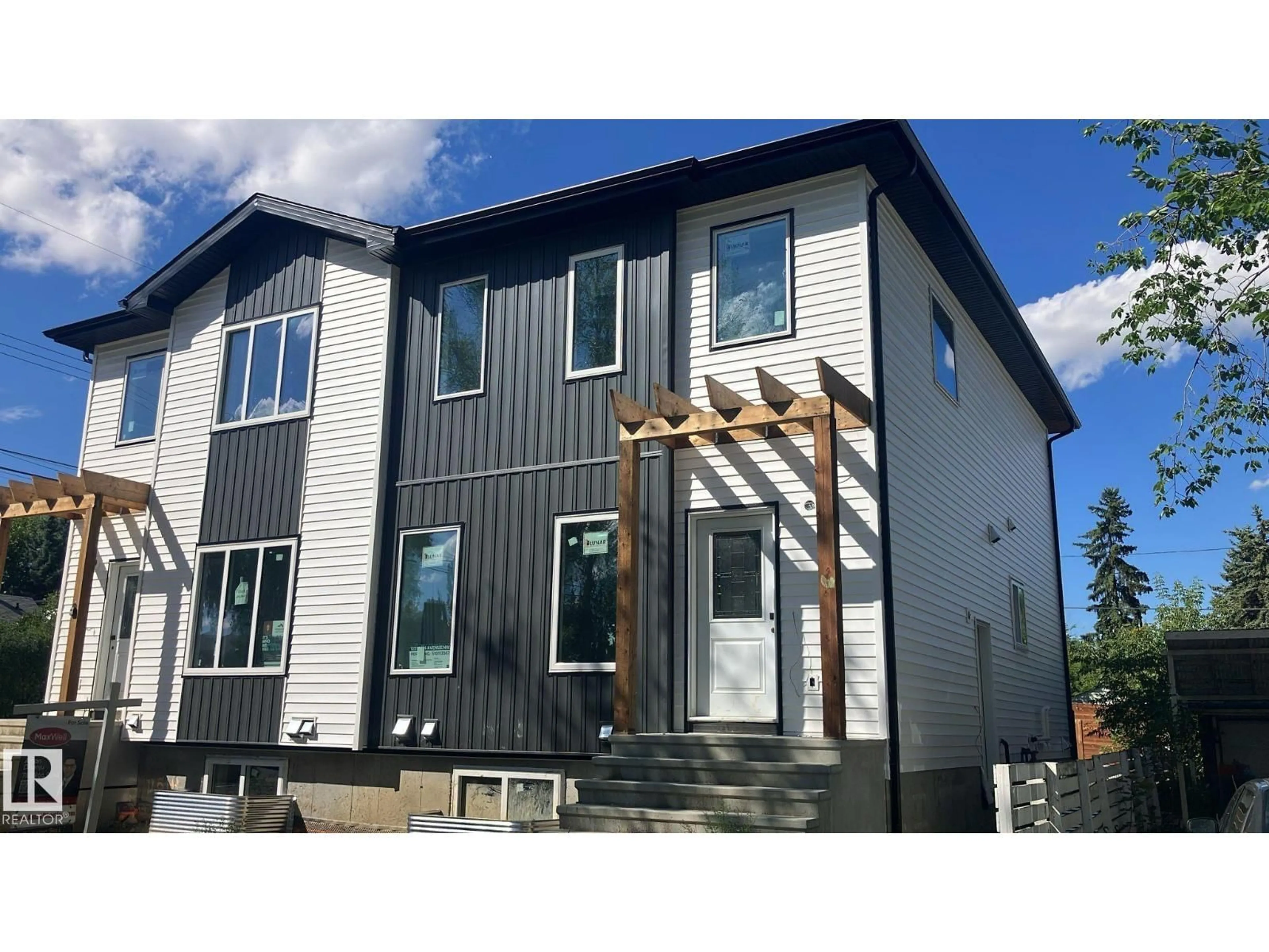 Home with vinyl exterior material, unknown for 12514 114 AV, Edmonton Alberta T5M2X6