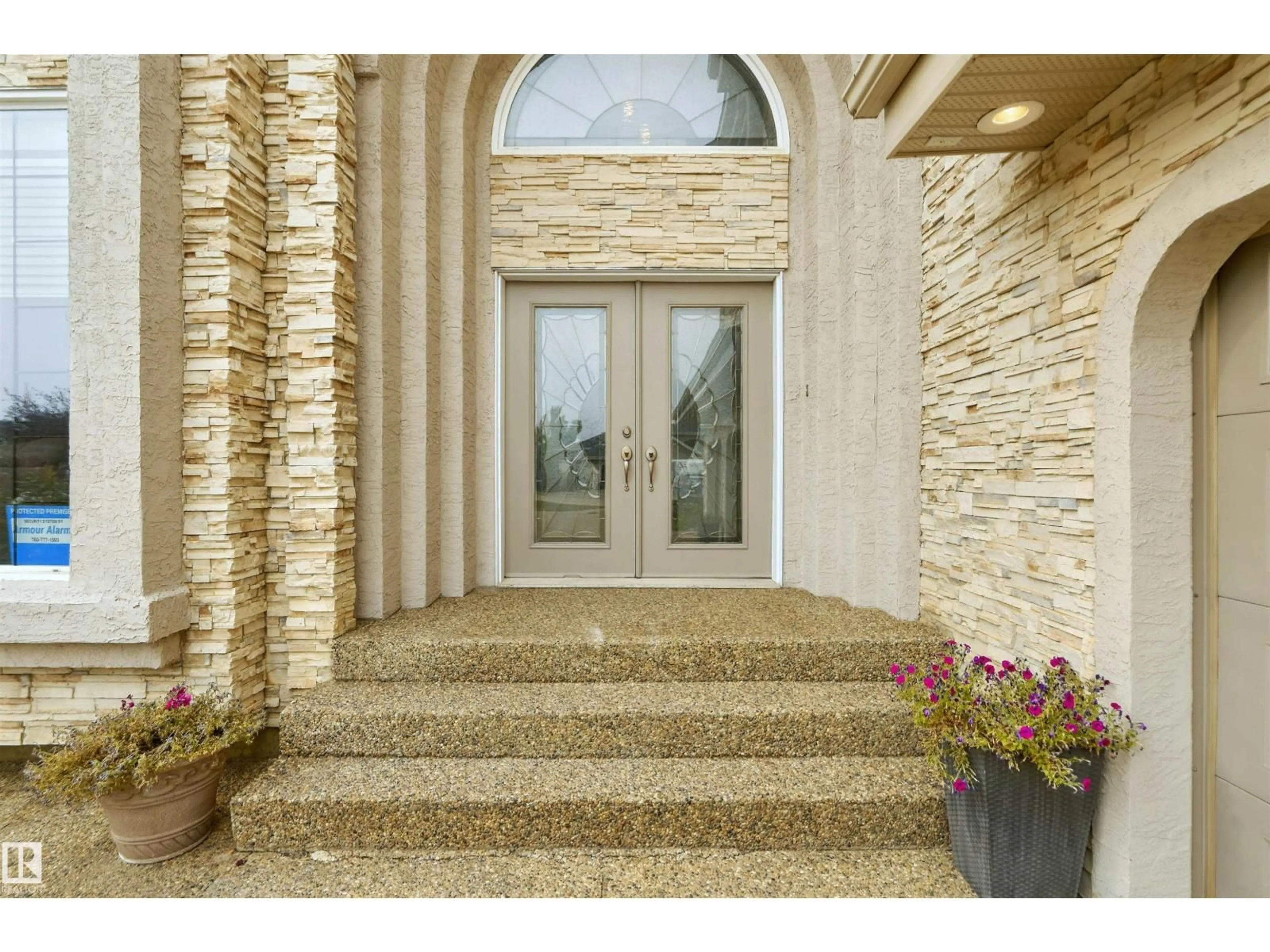 Indoor foyer for 2423 TEGLER GR, Edmonton Alberta T6R3K2