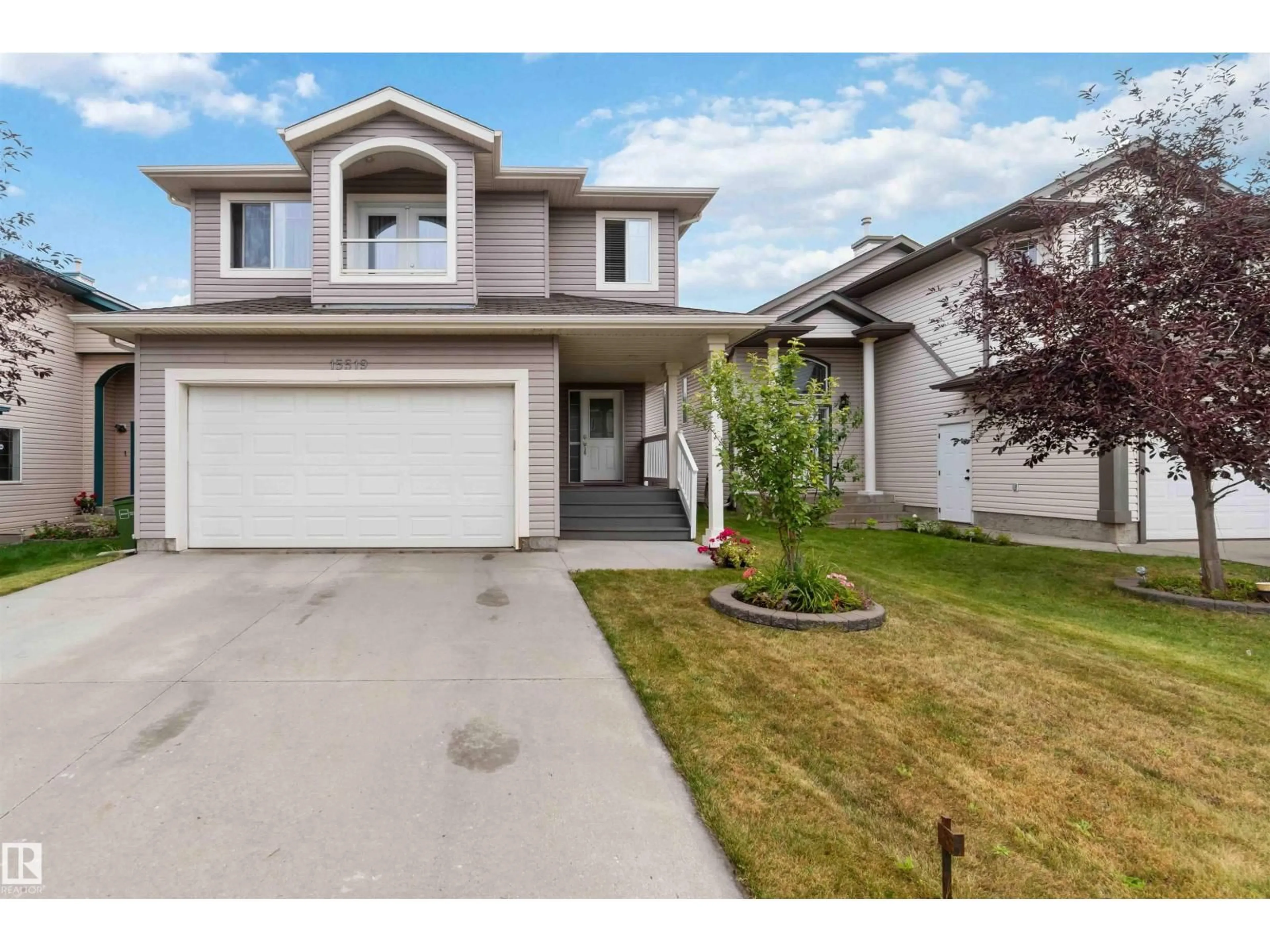 Home with vinyl exterior material, street for 15519 47 ST, Edmonton Alberta T5Y3L8