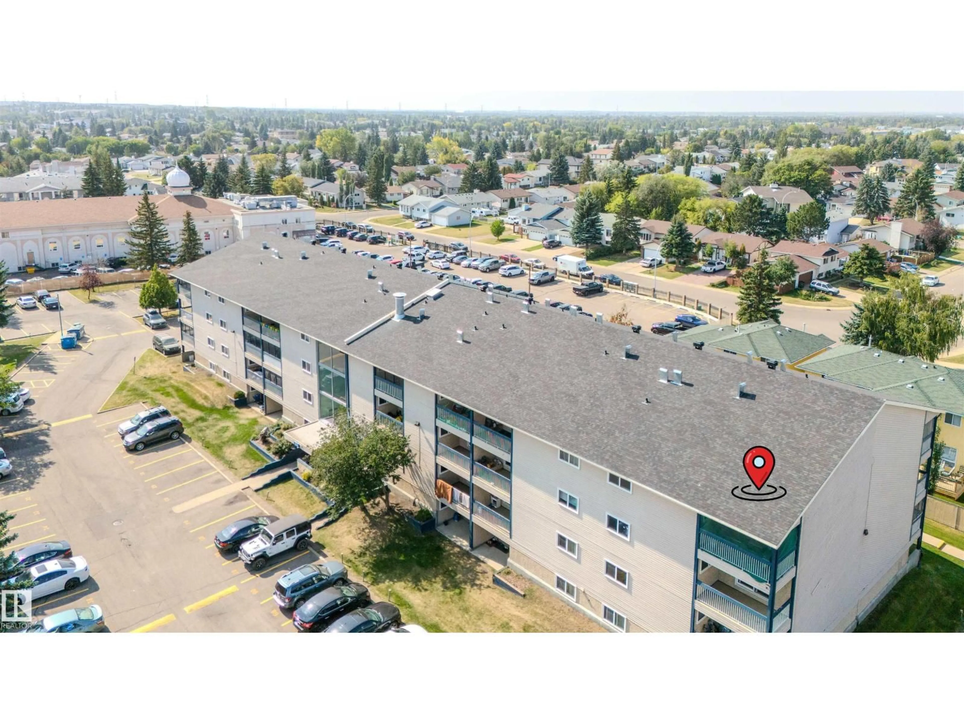 A pic from outside/outdoor area/front of a property/back of a property/a pic from drone, unknown for #311 - 2624 MILL WOODS RD E, Edmonton Alberta T6L5K7