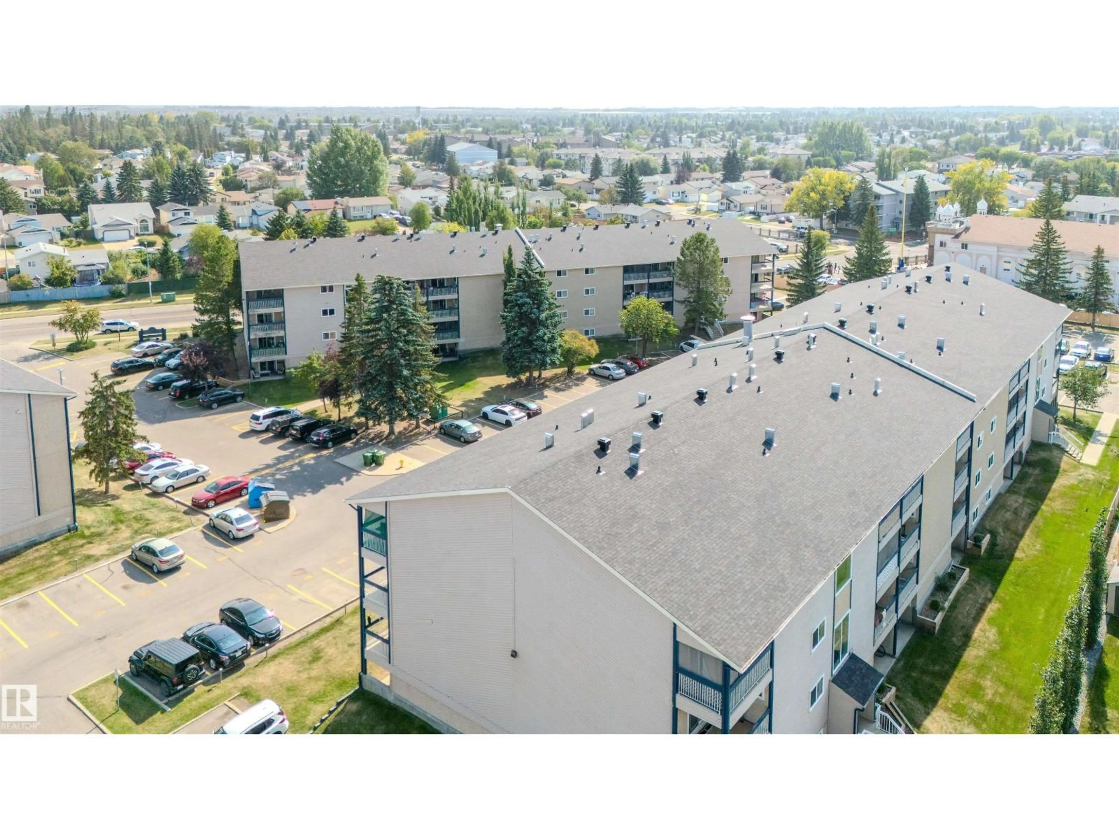 A pic from outside/outdoor area/front of a property/back of a property/a pic from drone, city buildings view from balcony for #311 - 2624 MILL WOODS RD E, Edmonton Alberta T6L5K7