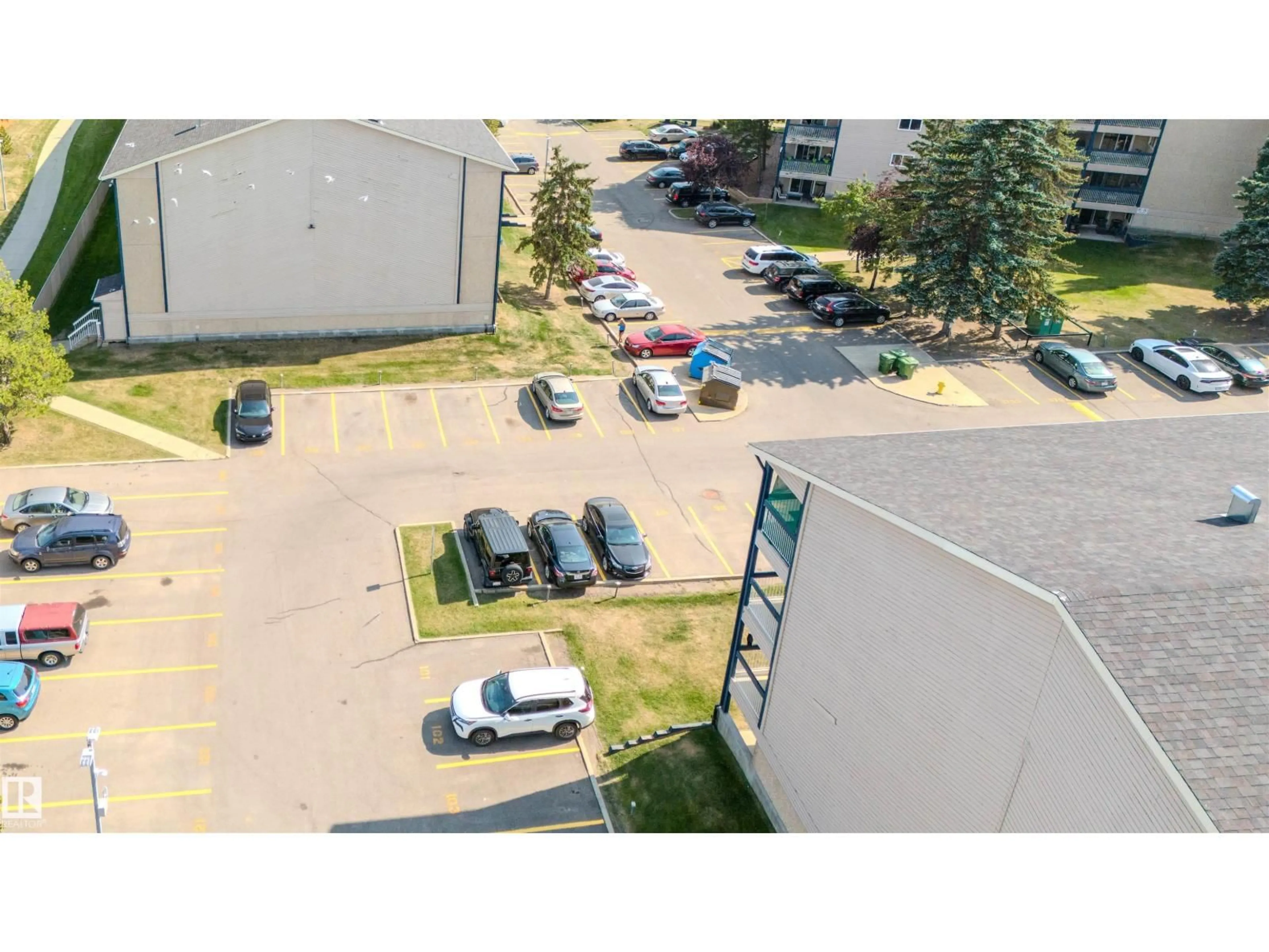 A pic from outside/outdoor area/front of a property/back of a property/a pic from drone, unknown for #311 - 2624 MILL WOODS RD E, Edmonton Alberta T6L5K7