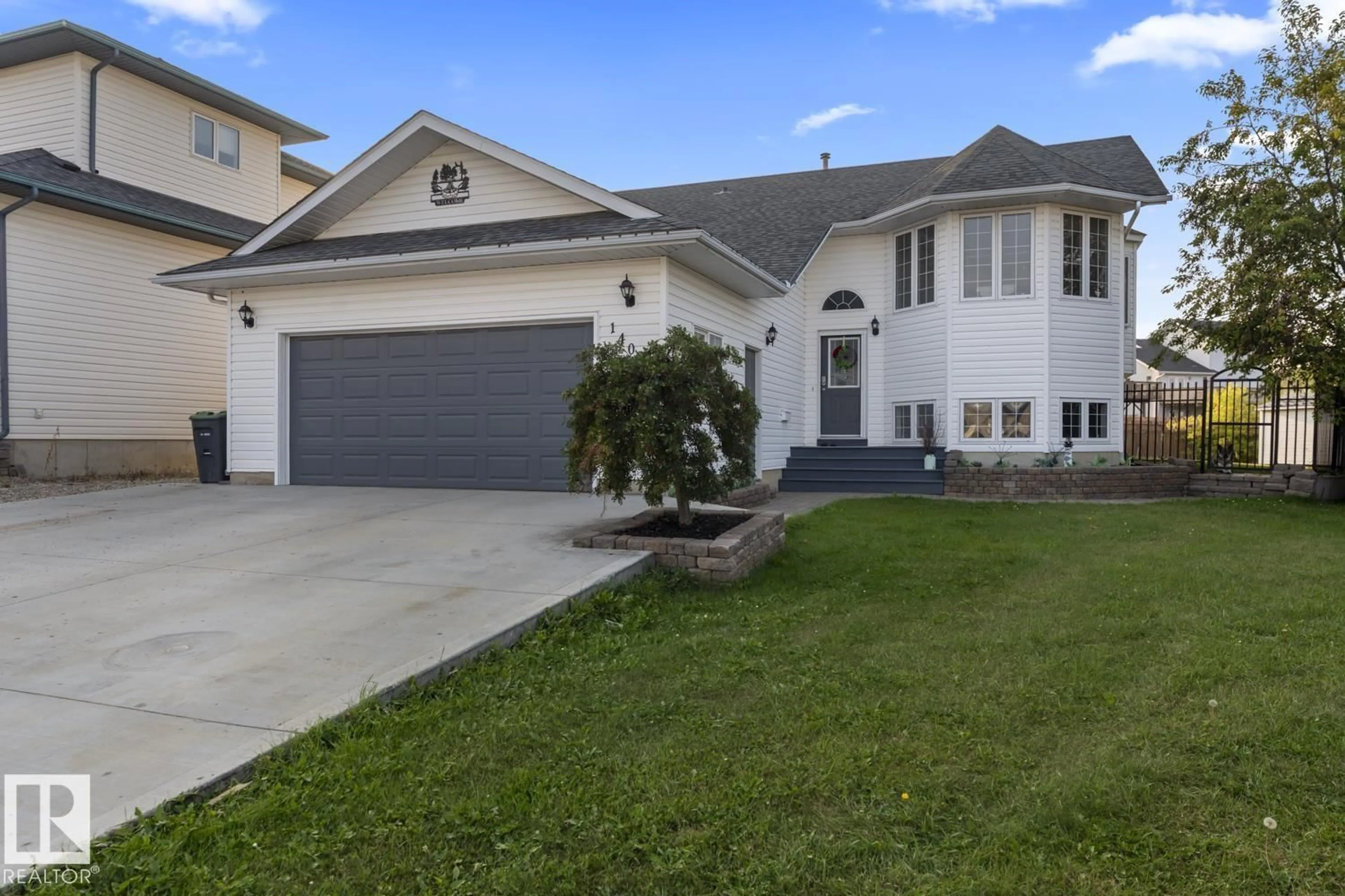 Home with vinyl exterior material, street for 1403 LAKERIDGE CL, Cold Lake Alberta T9M1K9
