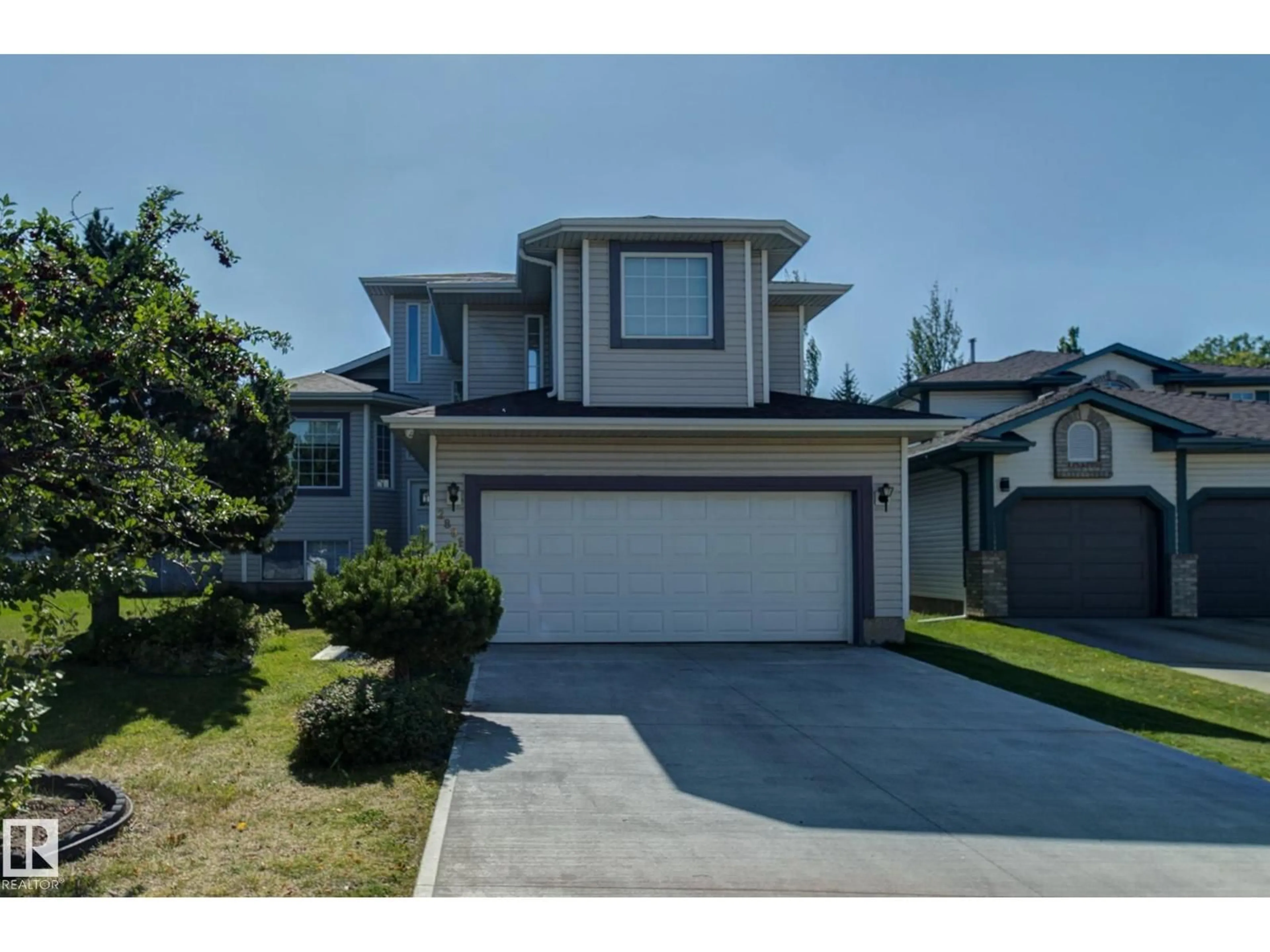 Home with vinyl exterior material, street for 2891 37A AV NW, Edmonton Alberta T6T1H7
