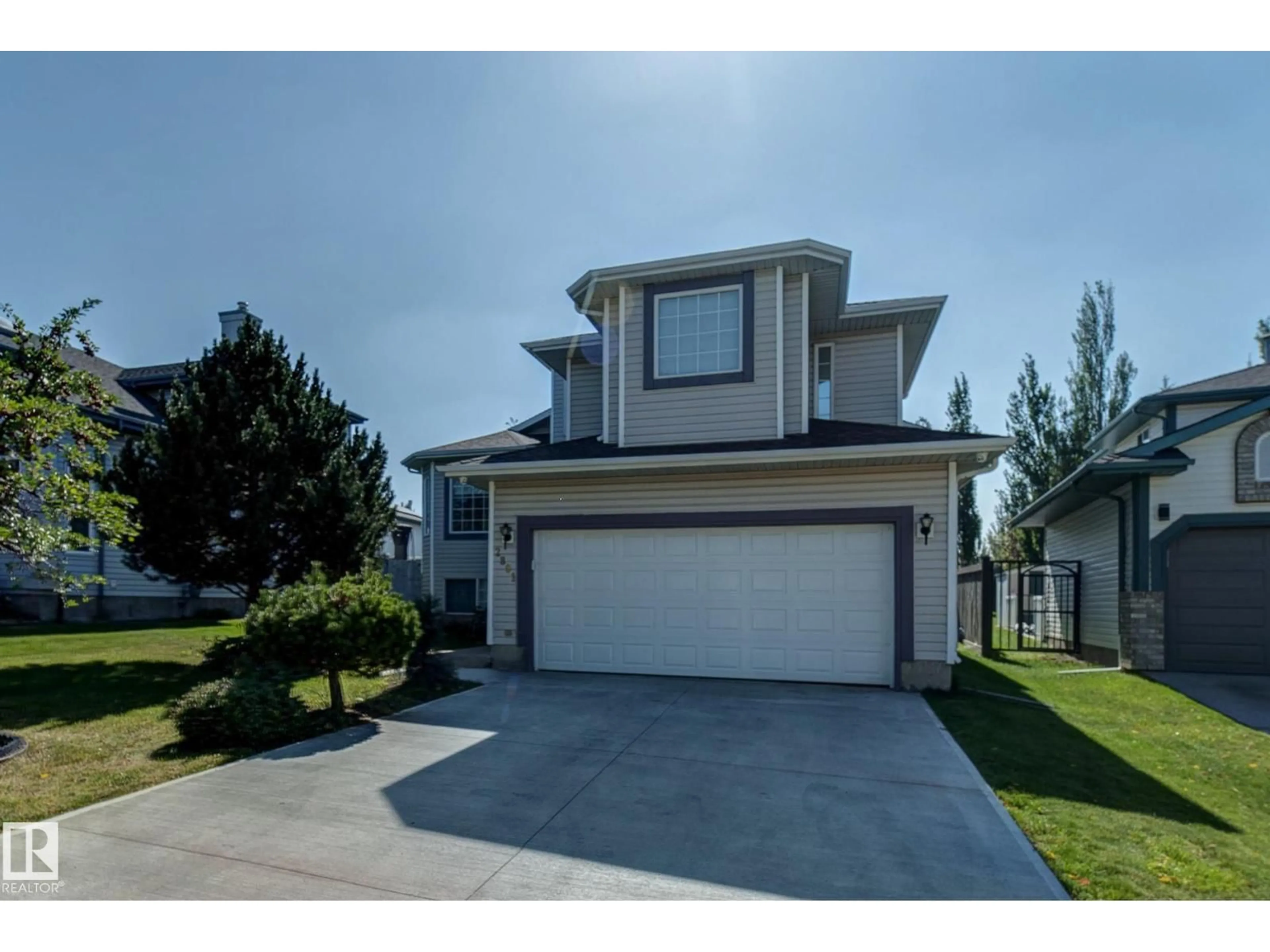 Home with vinyl exterior material, street for 2891 37A AV NW, Edmonton Alberta T6T1H7