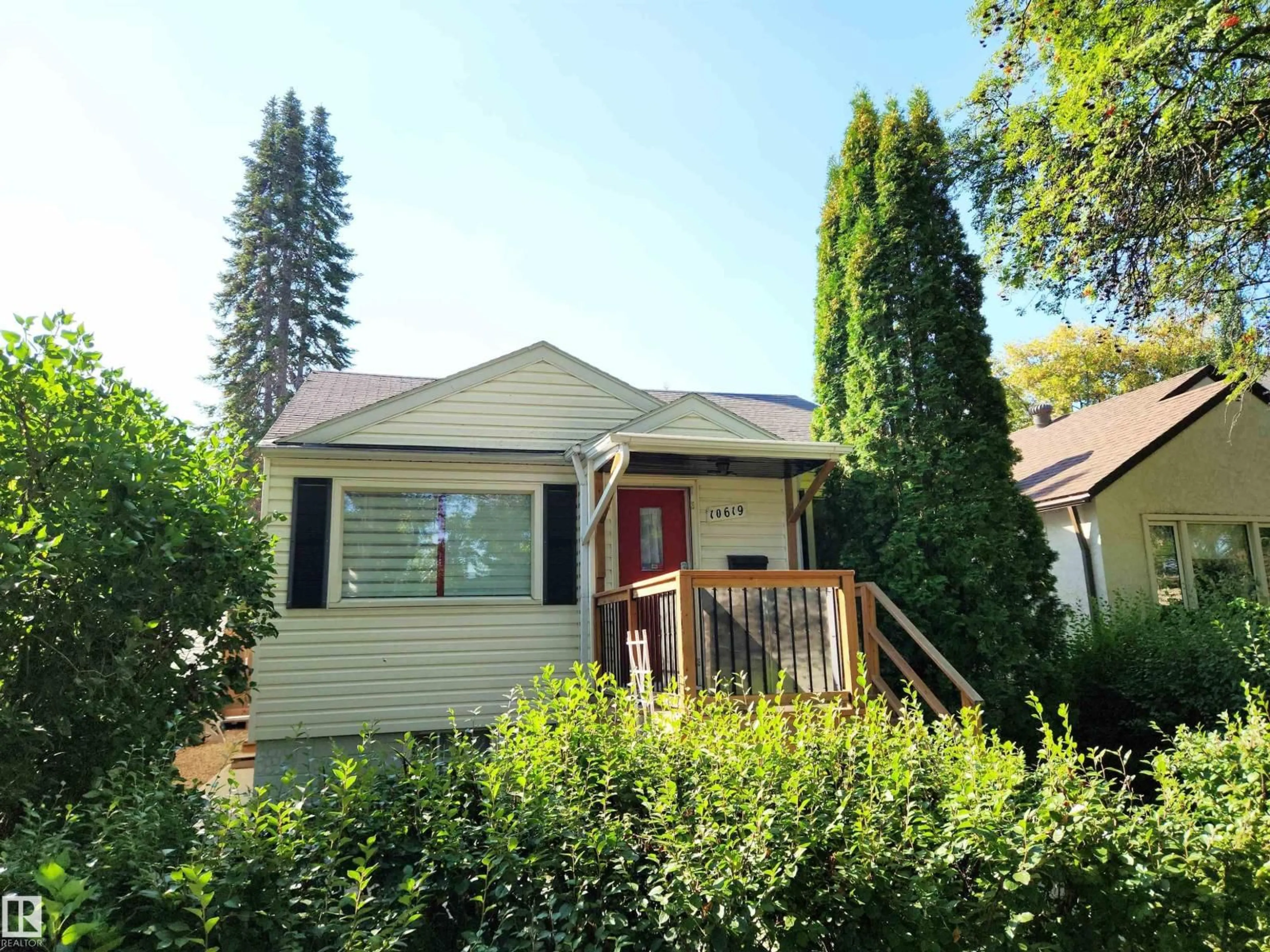 Home with vinyl exterior material, street for 10619 72 AV, Edmonton Alberta T6E0Z8
