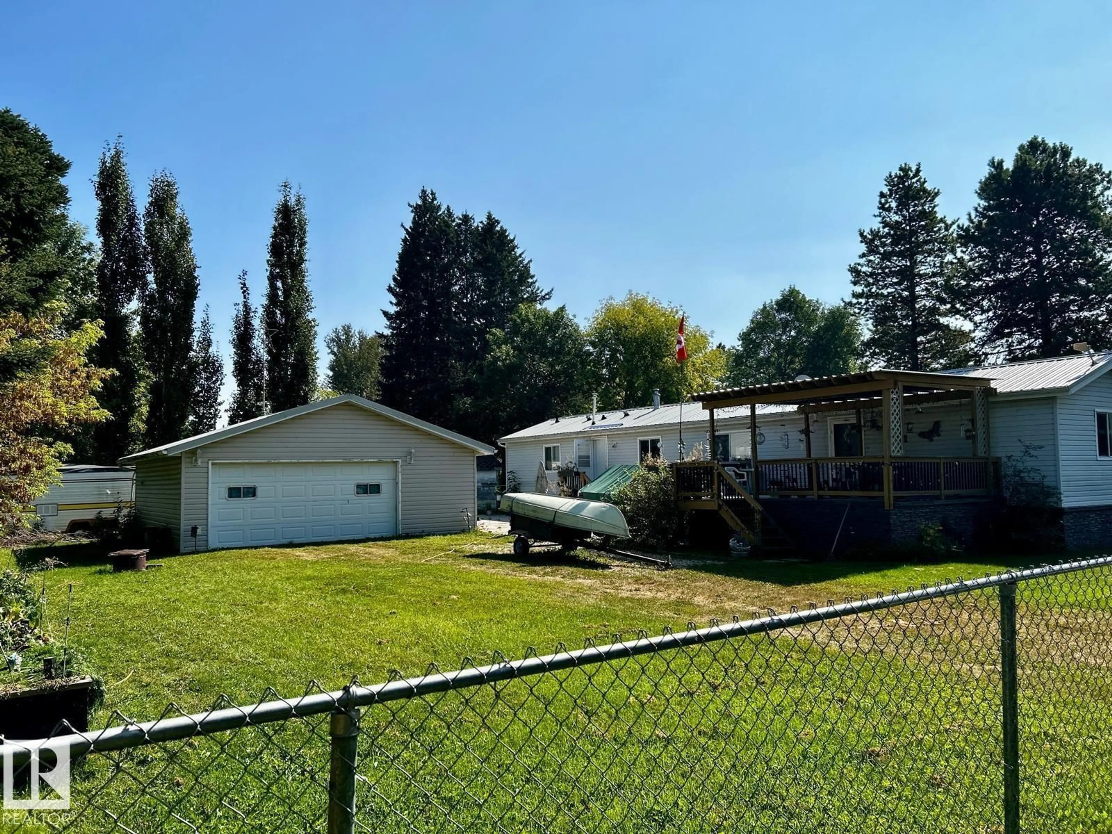 A pic from outside/outdoor area/front of a property/back of a property/a pic from drone, unknown for 109 4 STREET E, Rural Wetaskiwin County Alberta T0C0T0