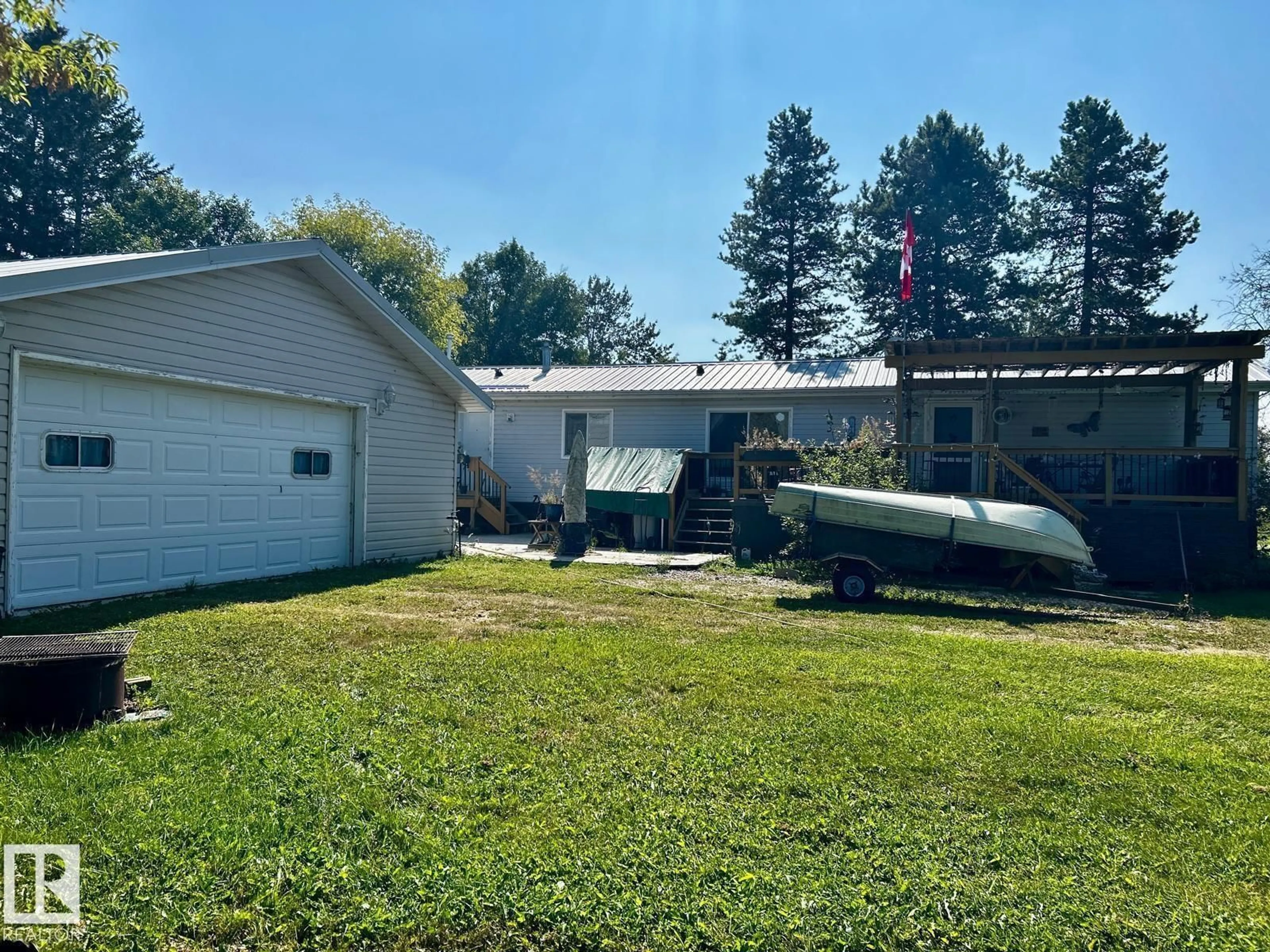 A pic from outside/outdoor area/front of a property/back of a property/a pic from drone, unknown for 109 4 STREET E, Rural Wetaskiwin County Alberta T0C0T0