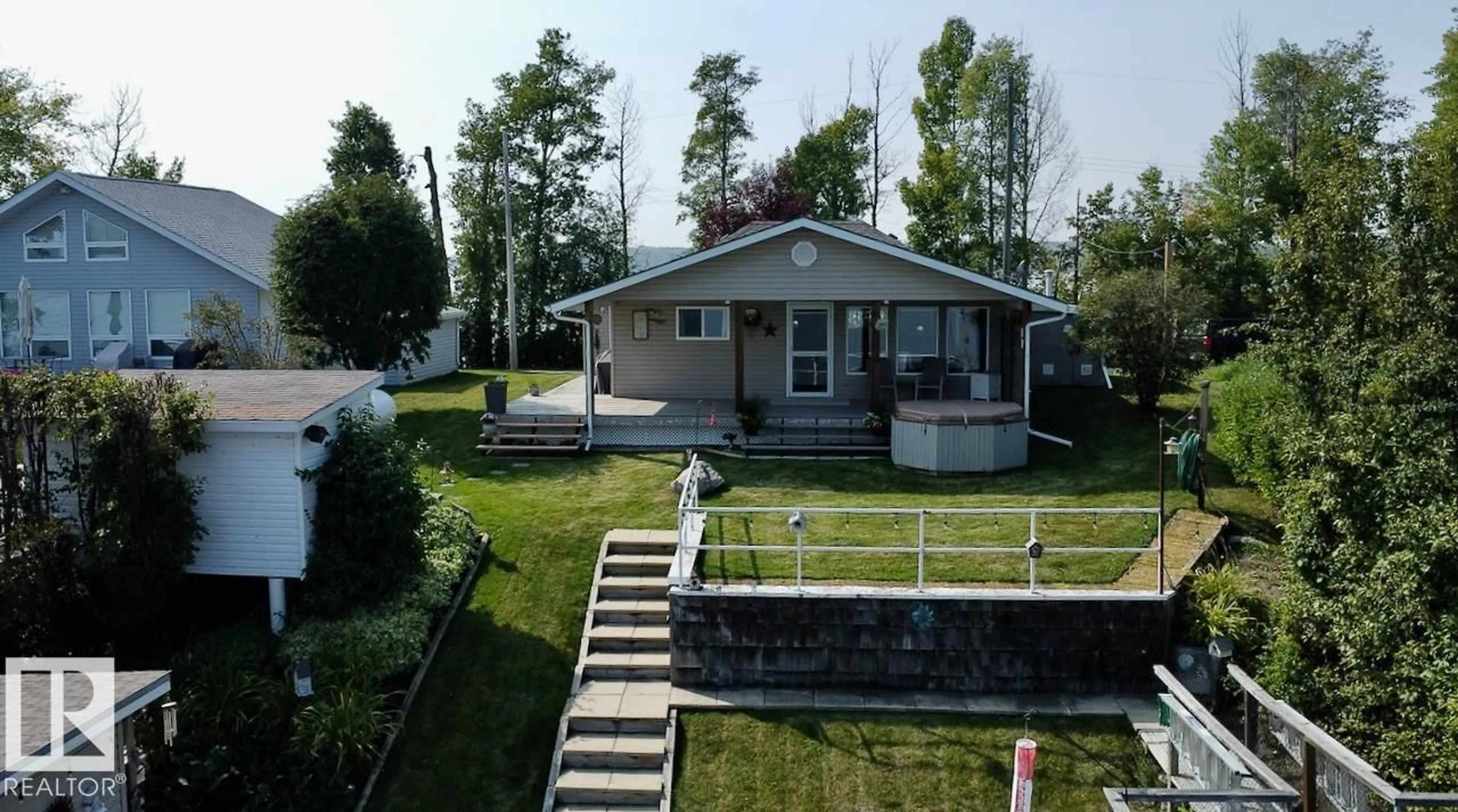 A pic from outside/outdoor area/front of a property/back of a property/a pic from drone, unknown for 37 - 5427 HWY 633 HWY, Rural Lac Ste. Anne County Alberta T0E0L0