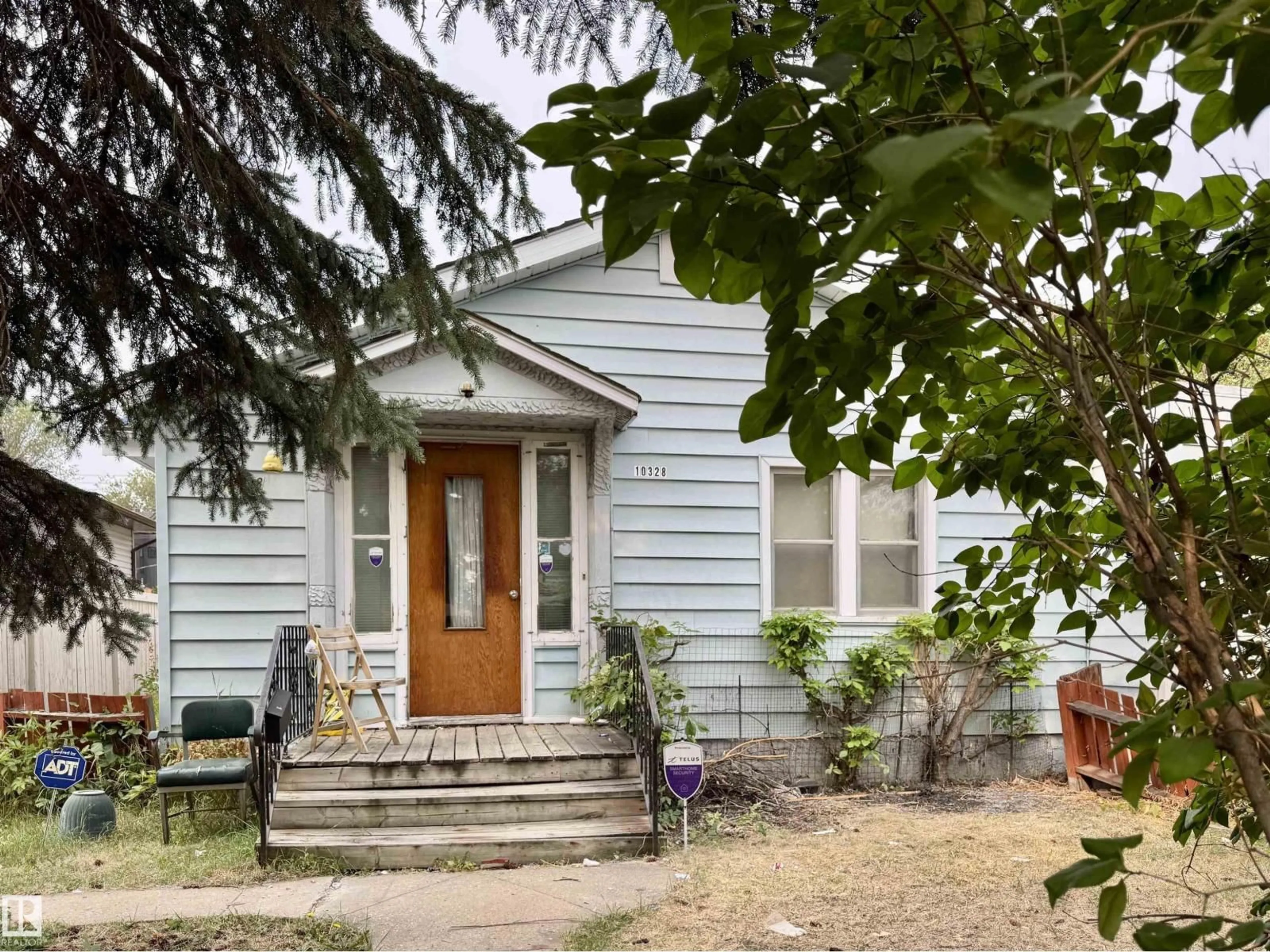 Home with vinyl exterior material, street for 10328 80 ST, Edmonton Alberta T6A3J4
