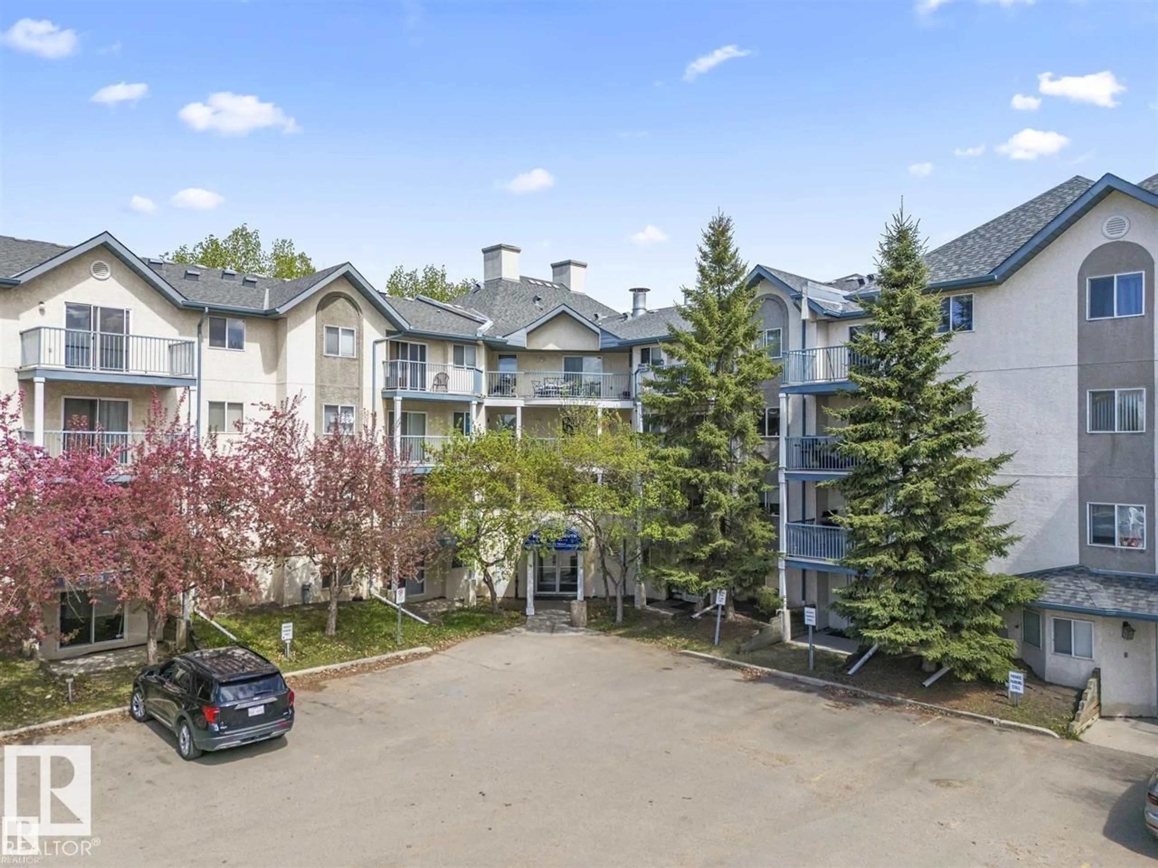 A pic from outside/outdoor area/front of a property/back of a property/a pic from drone, mountain view for #334 - 2520 50 ST, Edmonton Alberta T6L7A8
