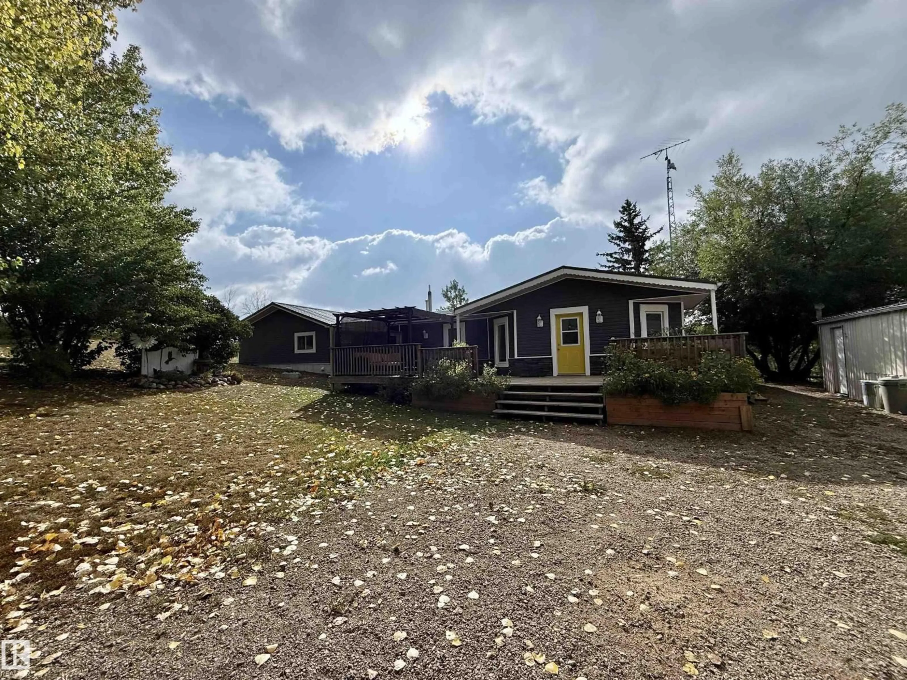 A pic from outside/outdoor area/front of a property/back of a property/a pic from drone, street for 102 - 450 RNG RD, Rural St. Paul County Alberta T0A3A0