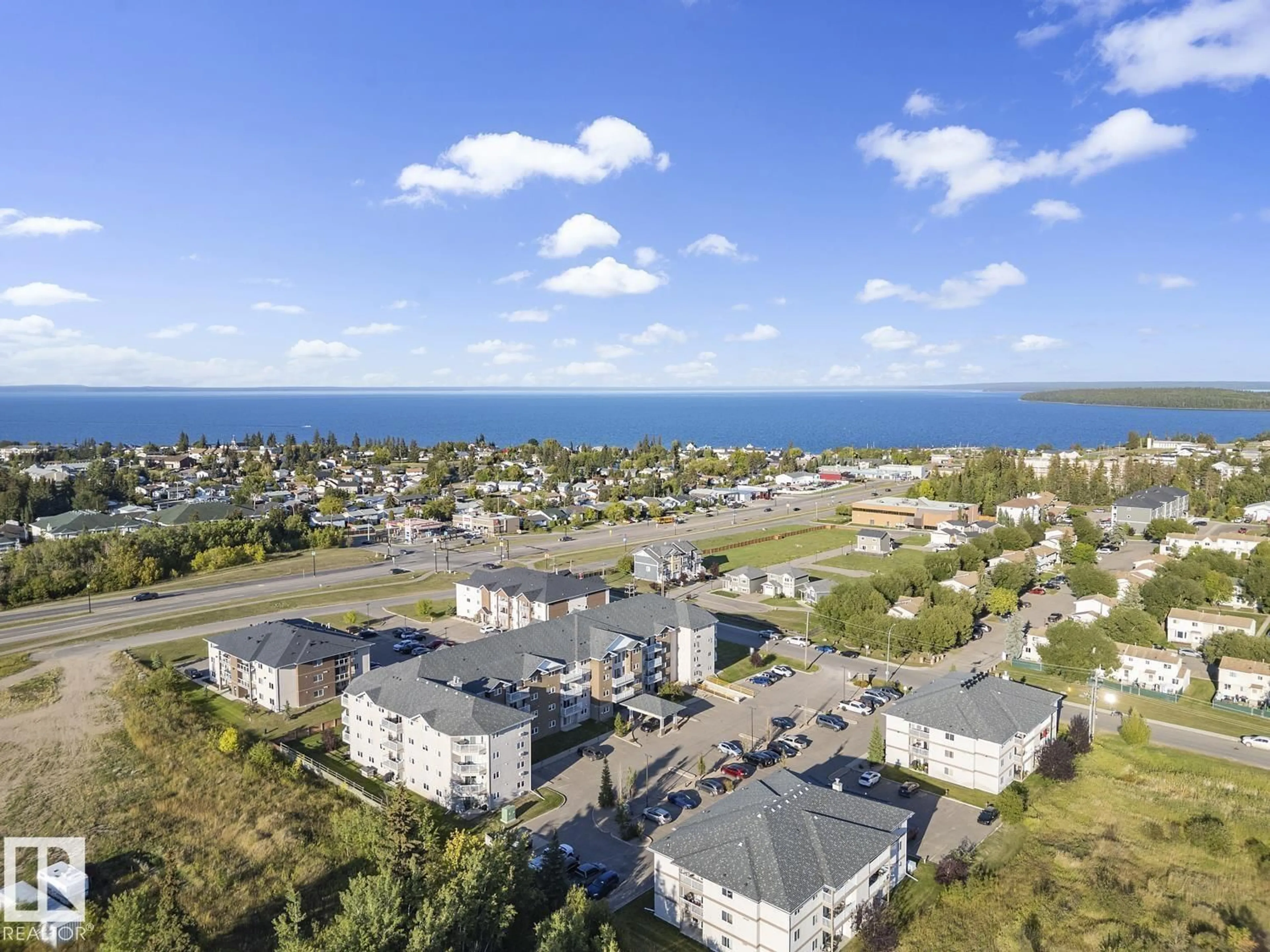 A pic from outside/outdoor area/front of a property/back of a property/a pic from drone, water/lake/river/ocean view for 901 - 3407 16 ST, Cold Lake Alberta T9M1K1