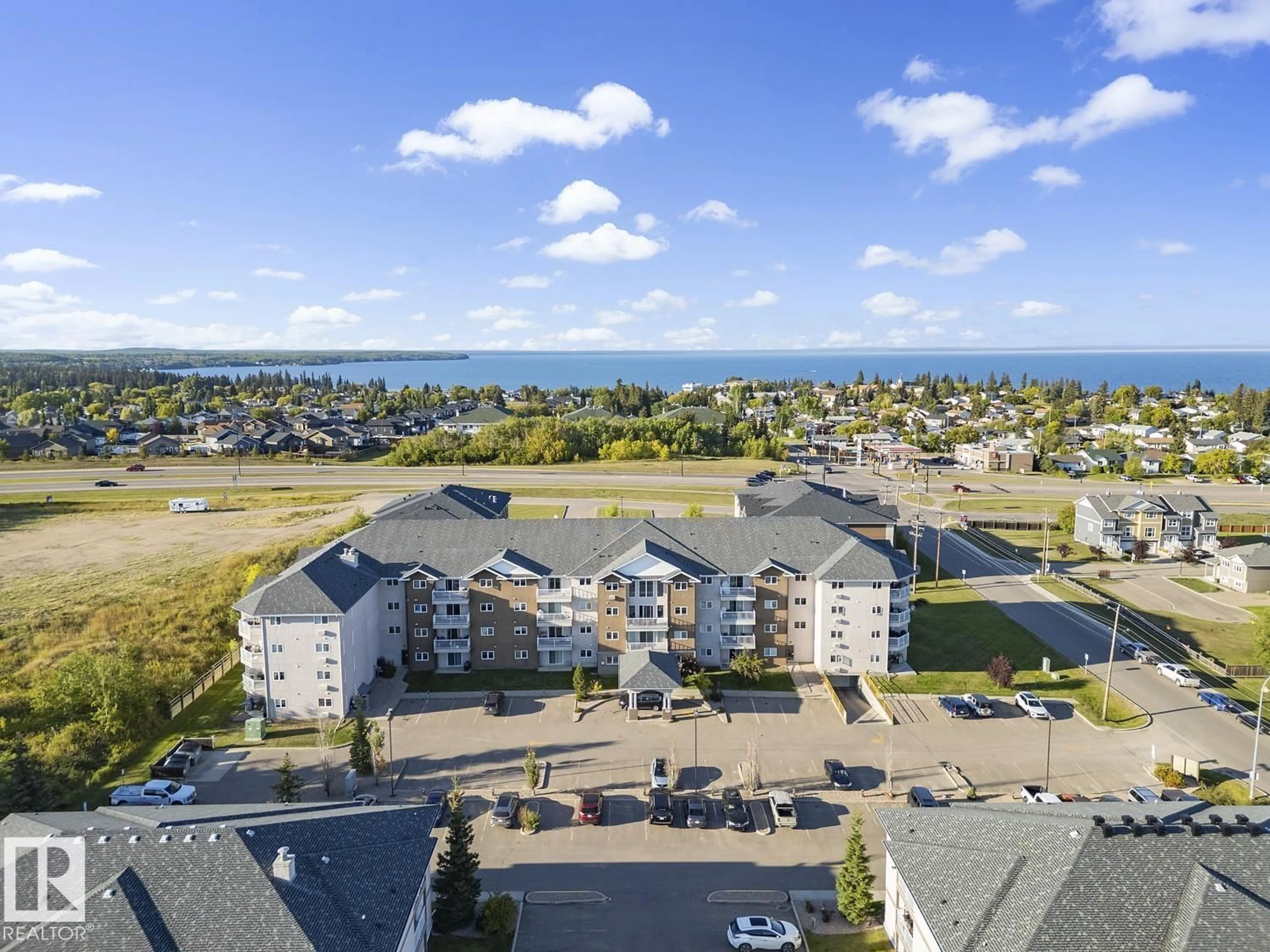 A pic from outside/outdoor area/front of a property/back of a property/a pic from drone, water/lake/river/ocean view for 901 - 3407 16 ST, Cold Lake Alberta T9M1K1