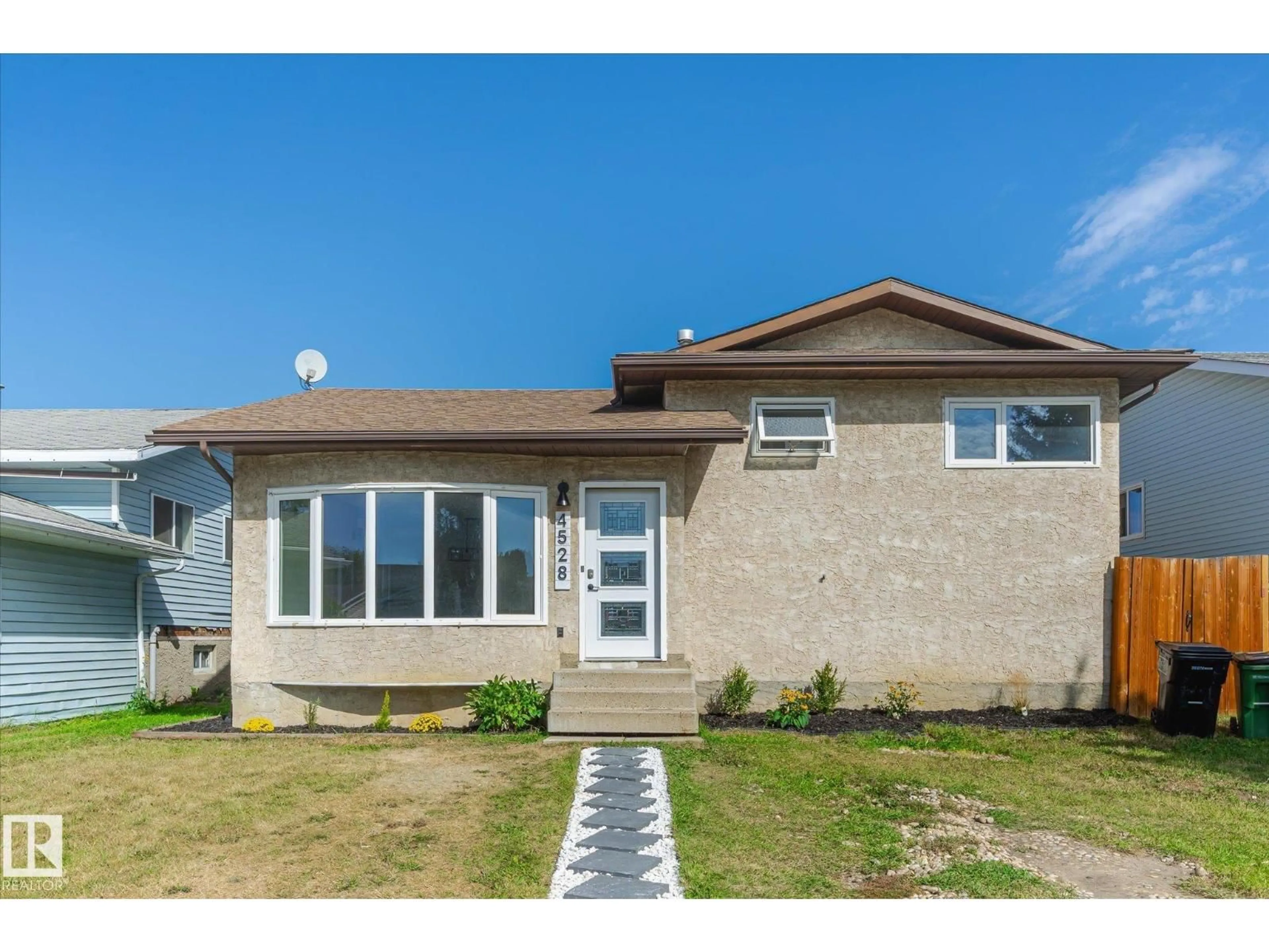 Home with vinyl exterior material, street for 4528 29 AV, Edmonton Alberta T6L4S4