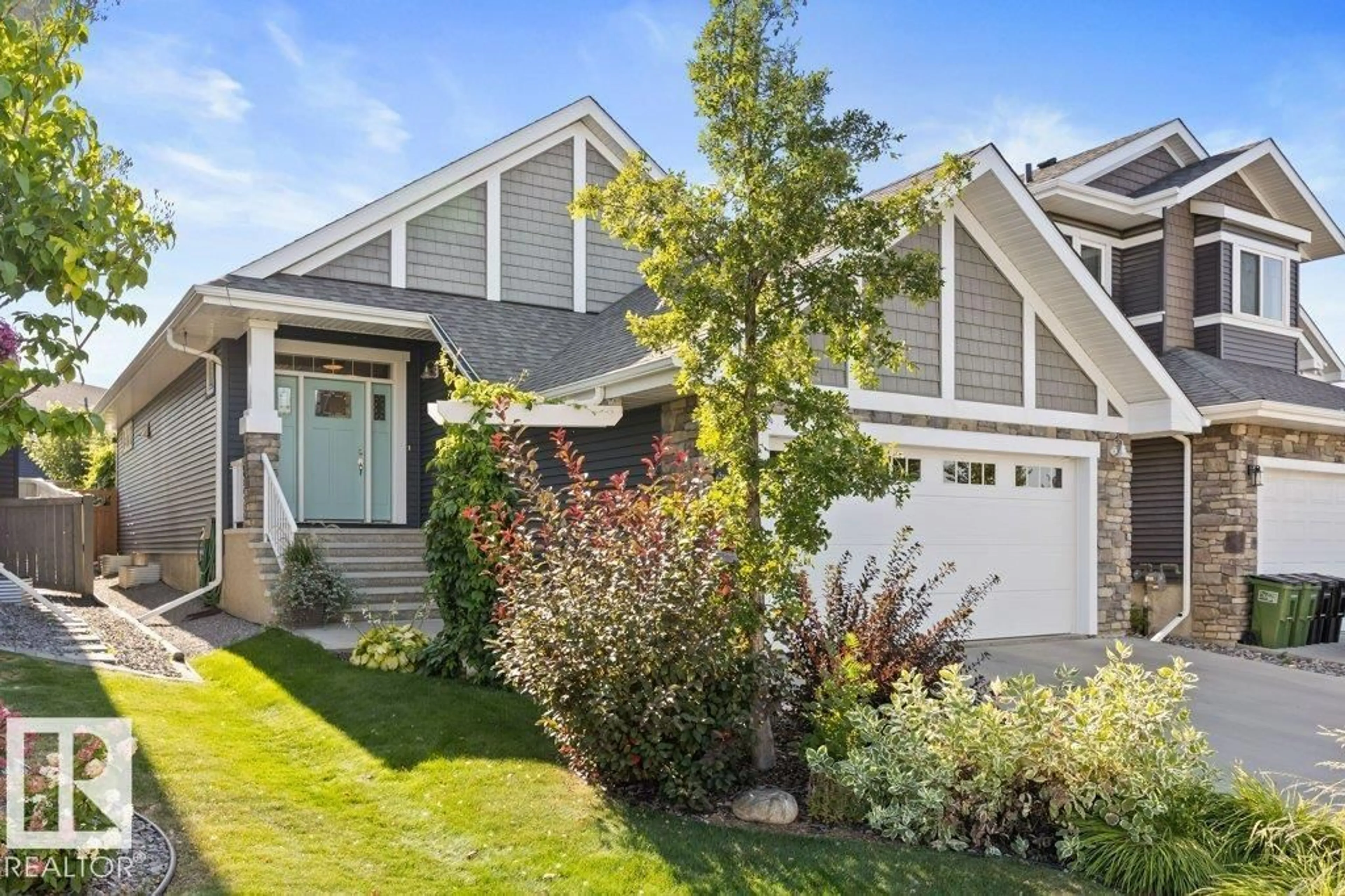 Home with vinyl exterior material, street for 1715 TANAGER CL, Edmonton Alberta T5S0M5