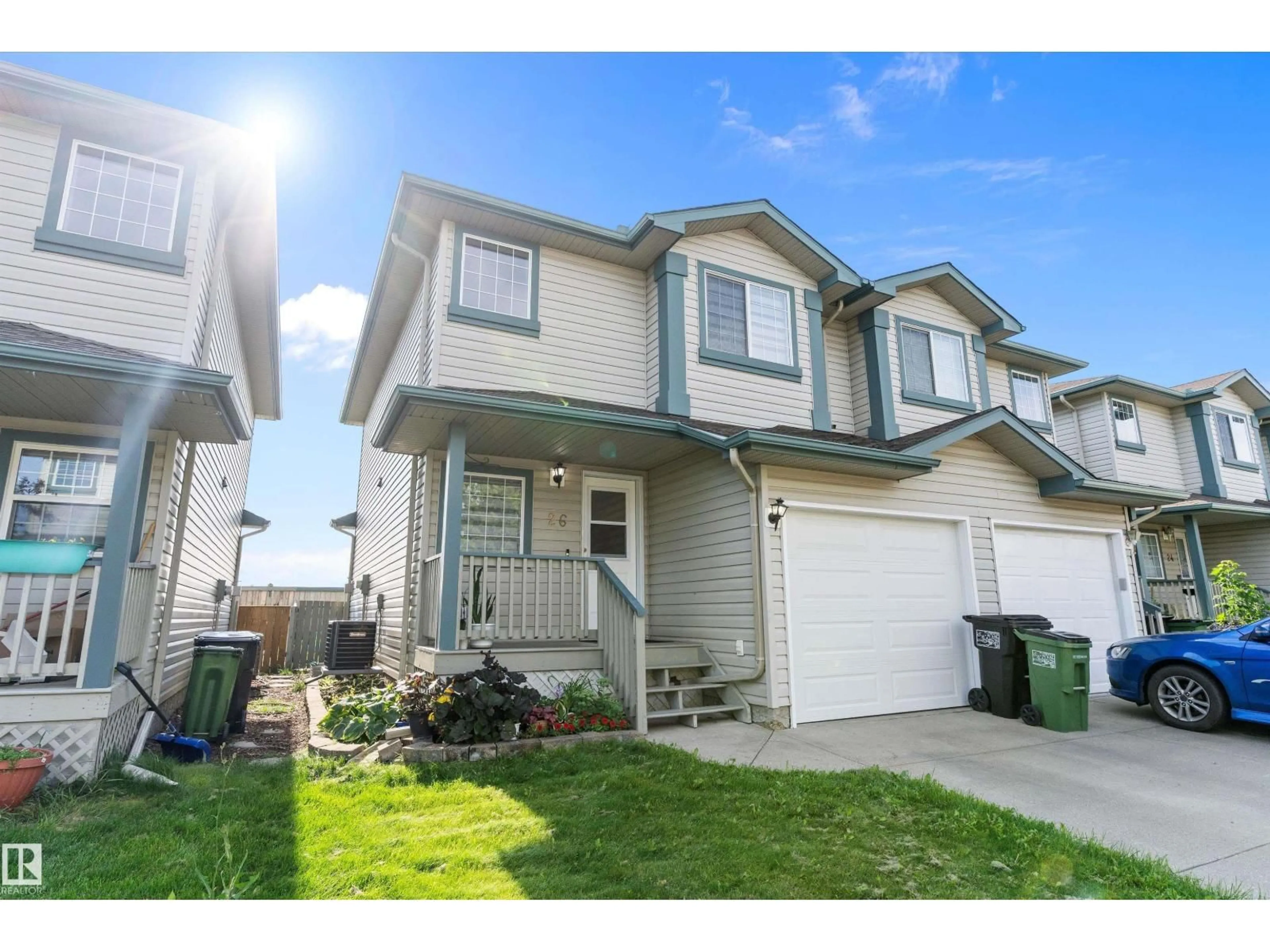 Home with vinyl exterior material, street for 14803 - 26 MILLER BV, Edmonton Alberta T5Y2Z9