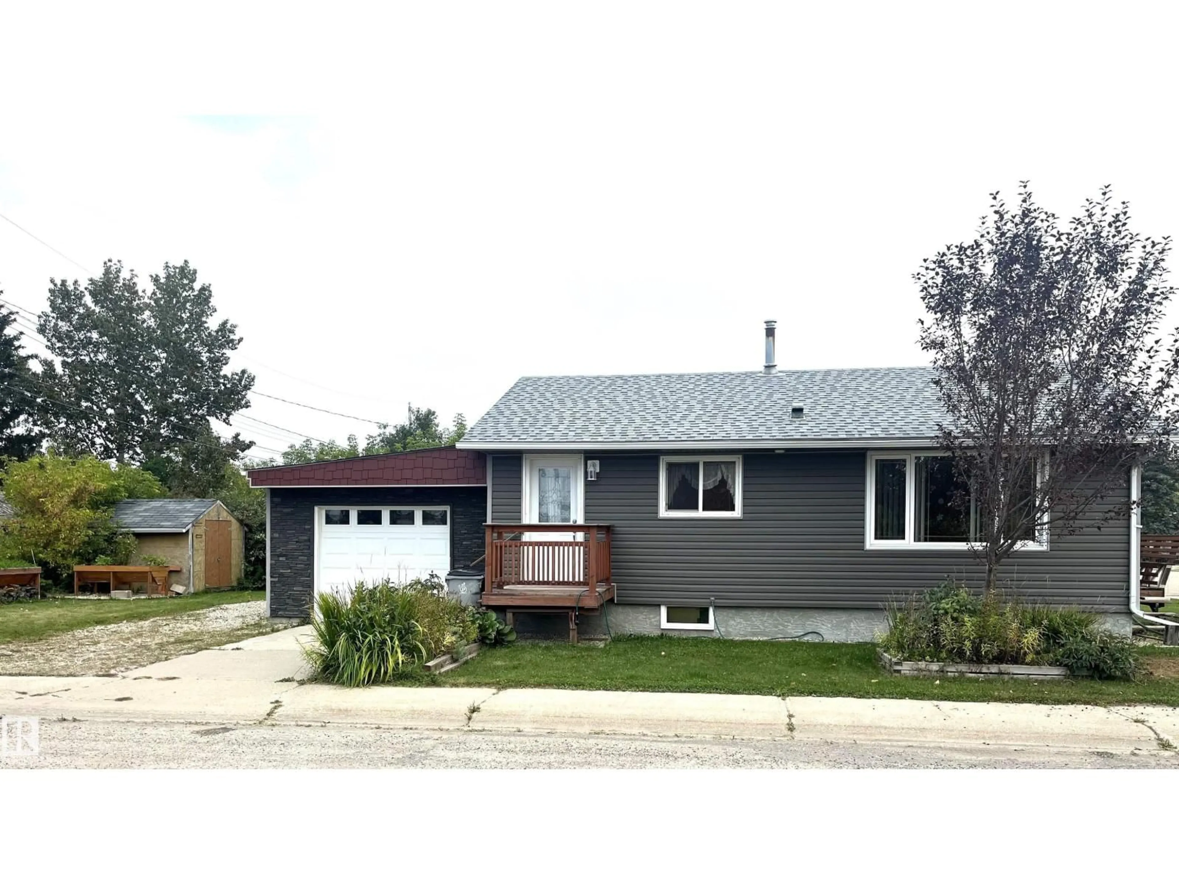 Home with vinyl exterior material, street for 4820 51 AVE, Evansburg Alberta T0E0T0