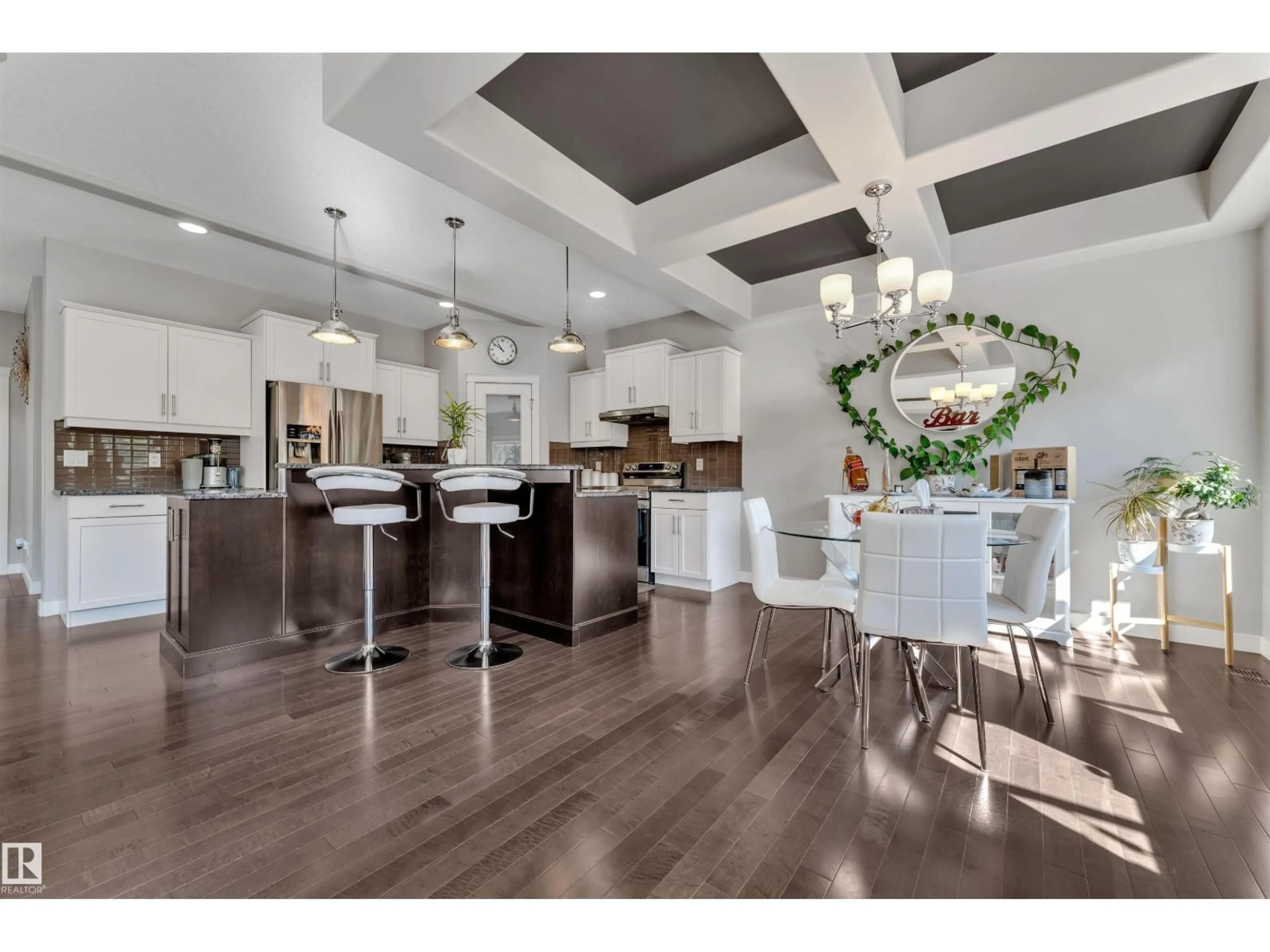 Open concept kitchen, wood/laminate floor for SW - 1907 67 ST, Edmonton Alberta T6X0L9