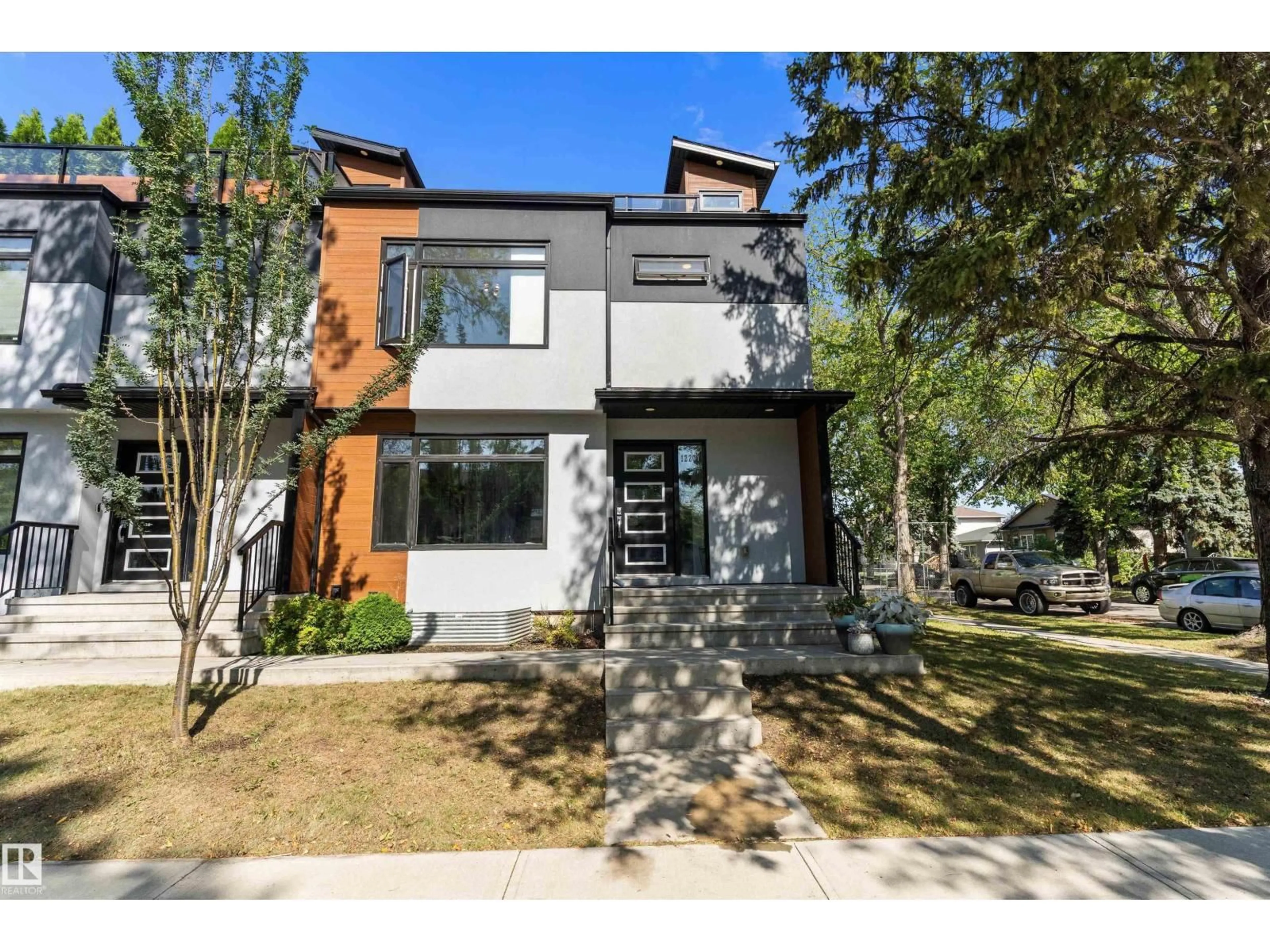Home with brick exterior material, street for A - 12204 117 AV, Edmonton Alberta T5M0C3