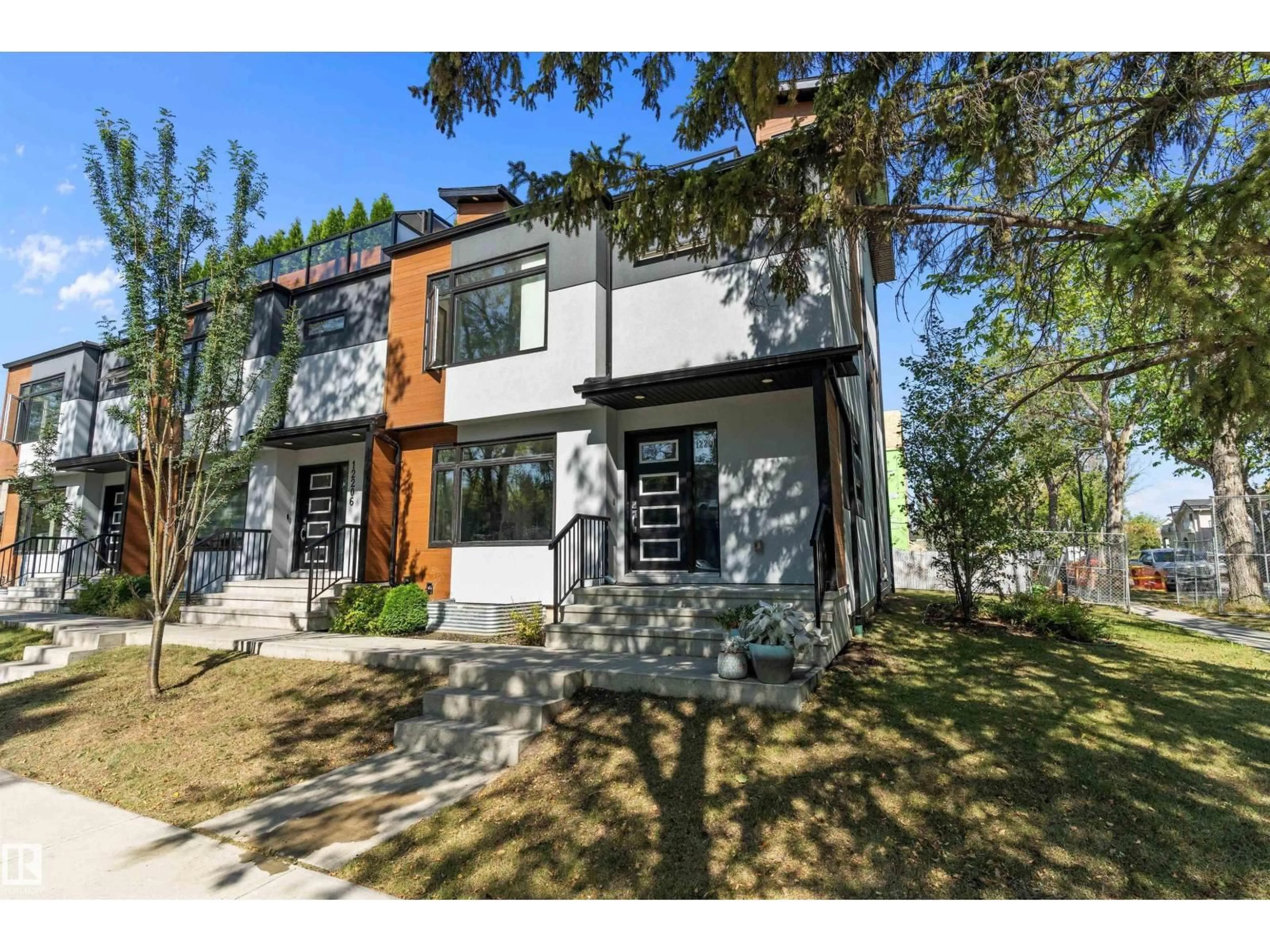 Home with brick exterior material, street for A - 12204 117 AV, Edmonton Alberta T5M0C3