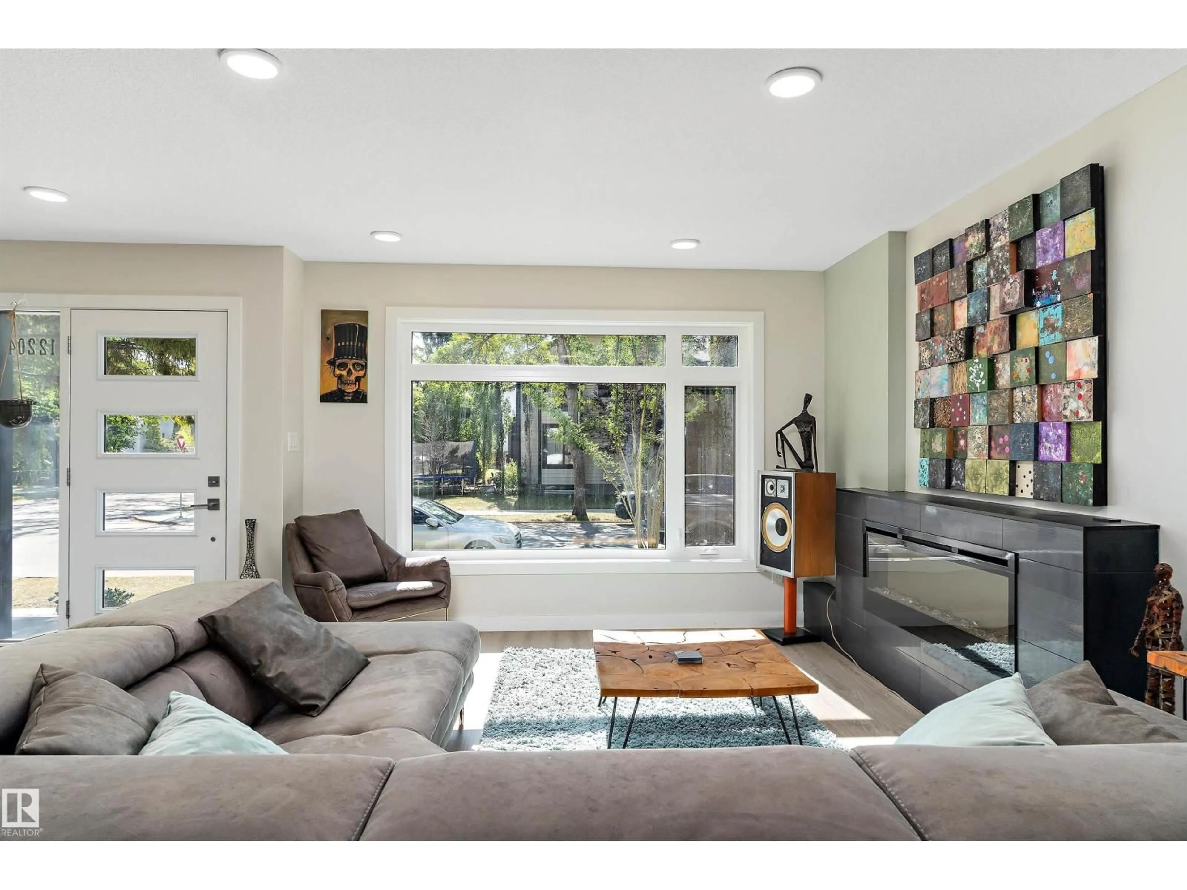 Living room with furniture, unknown for A - 12204 117 AV, Edmonton Alberta T5M0C3