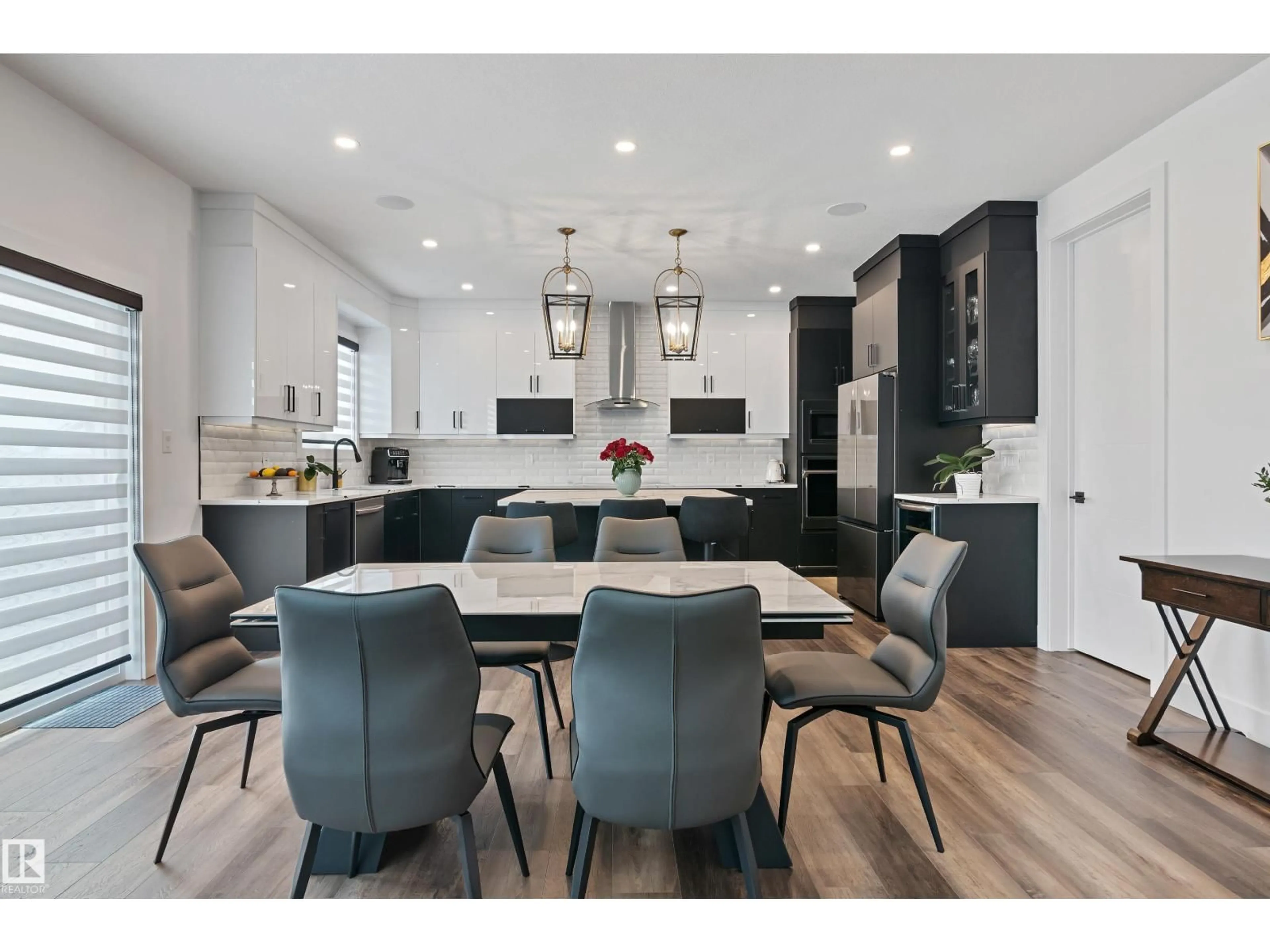 Open concept kitchen, wood/laminate floor for 19619 26 AV, Edmonton Alberta T6M0X4