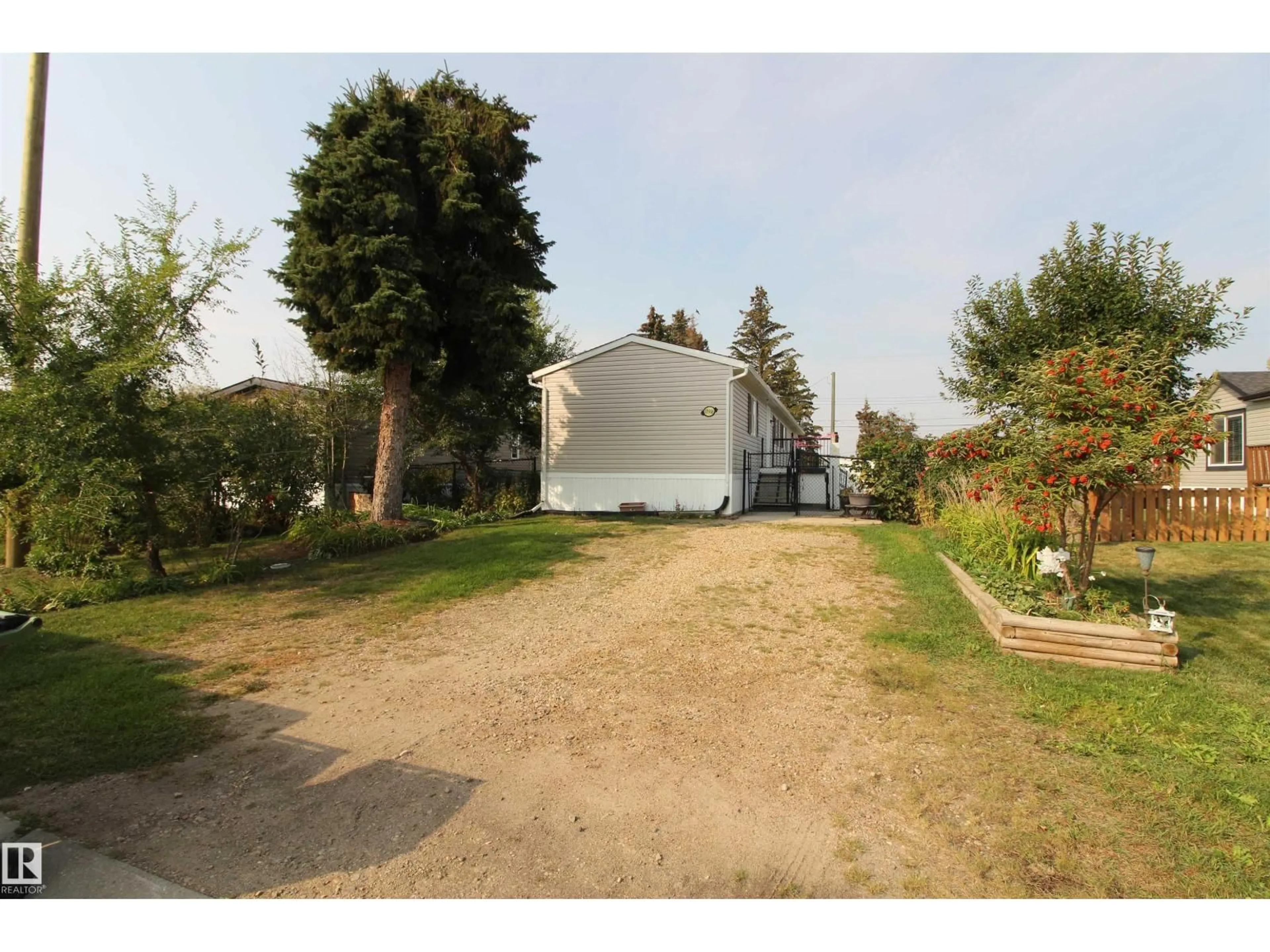 A pic from outside/outdoor area/front of a property/back of a property/a pic from drone, street for 10916 100 AV, Westlock Alberta T7P1N2