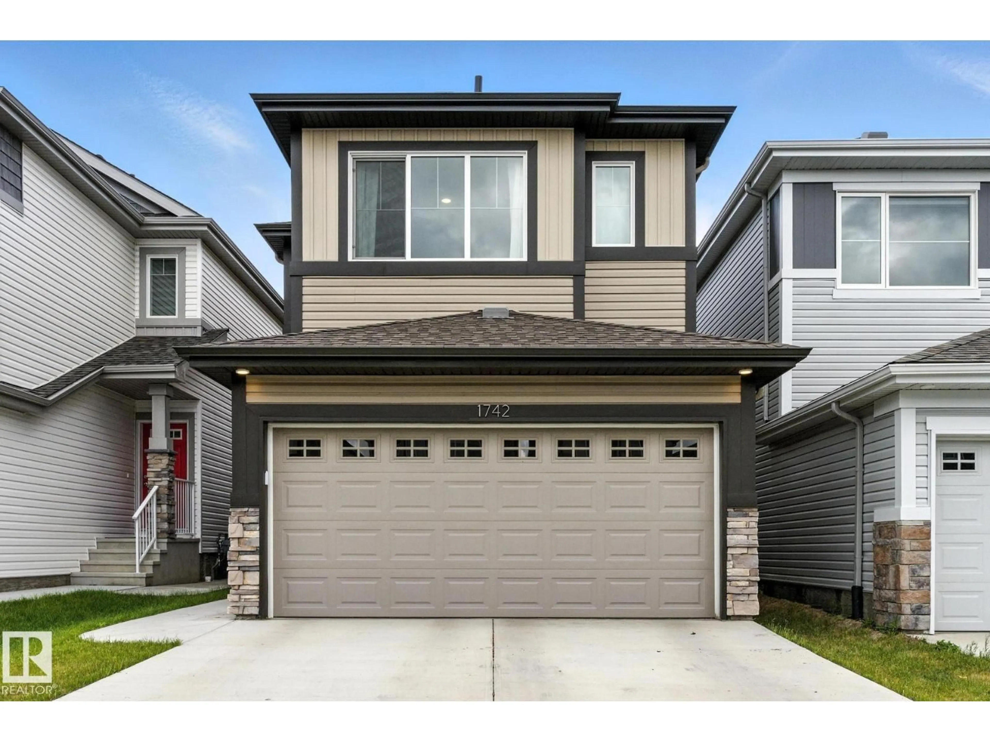 Home with vinyl exterior material, street for 1742 ERKER WY, Edmonton Alberta T6M1J2