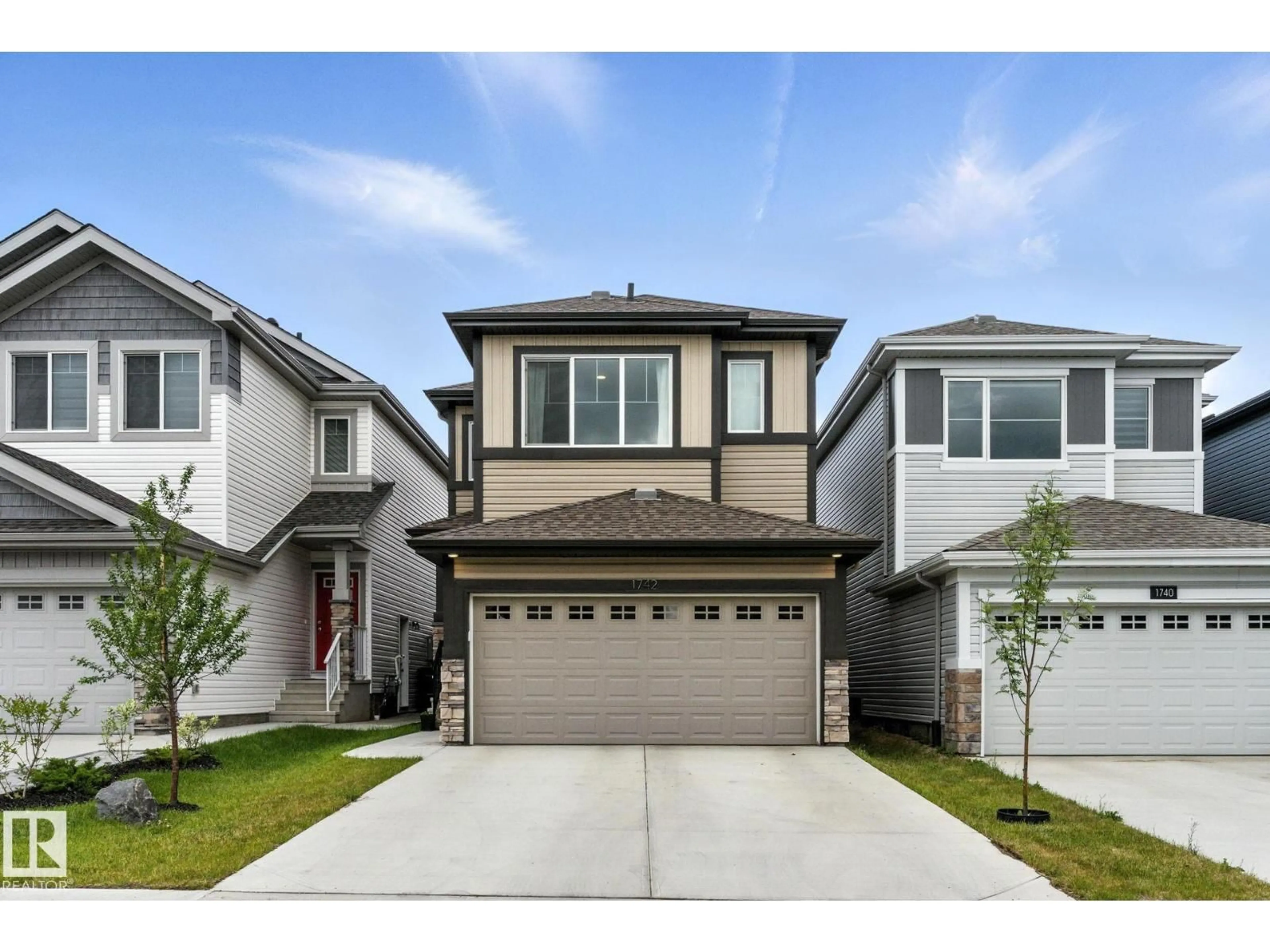 Home with vinyl exterior material, street for 1742 ERKER WY, Edmonton Alberta T6M1J2