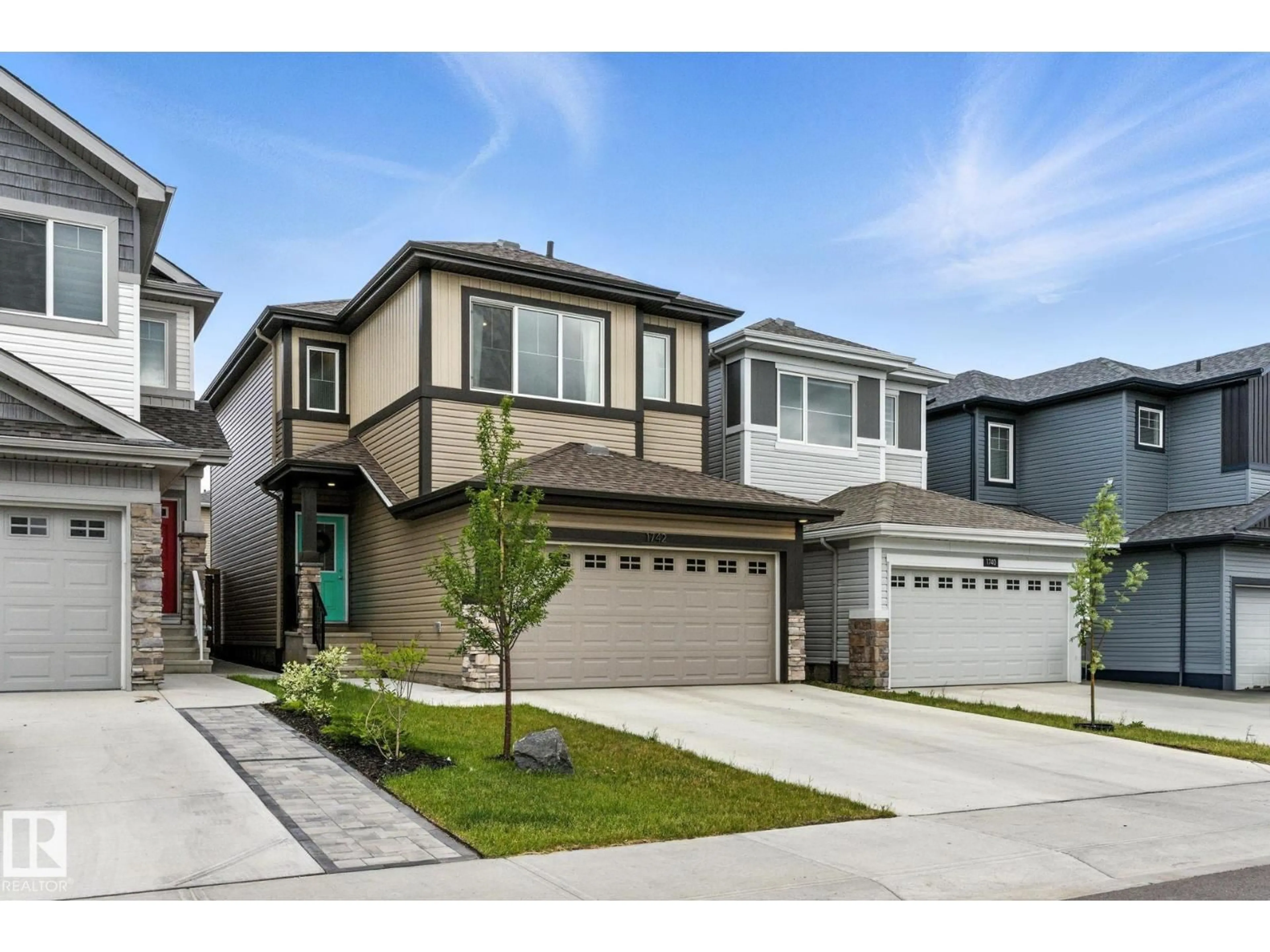 Home with vinyl exterior material, street for 1742 ERKER WY, Edmonton Alberta T6M1J2