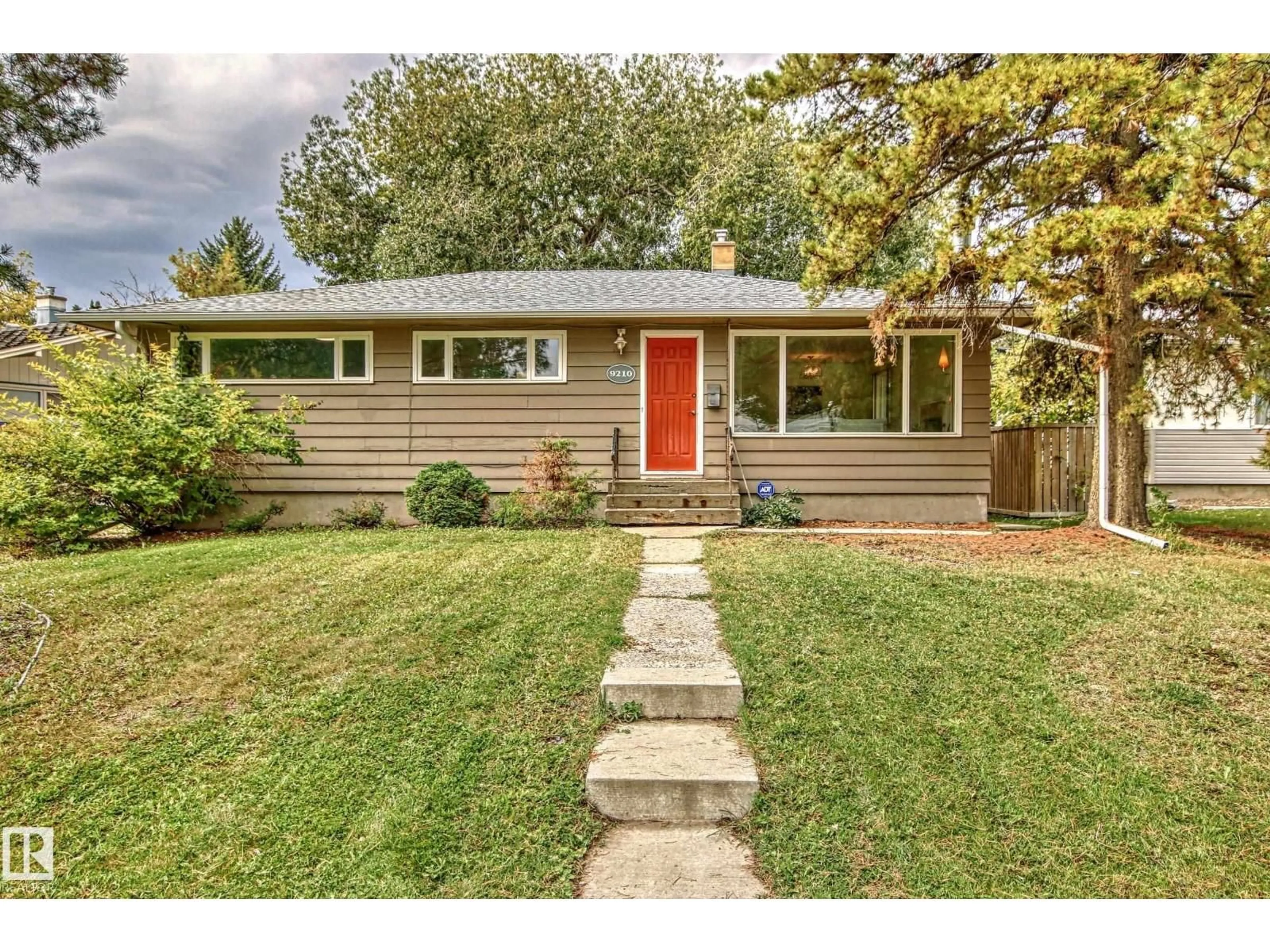 Home with vinyl exterior material, street for 9210 157 ST, Edmonton Alberta T5R2B1