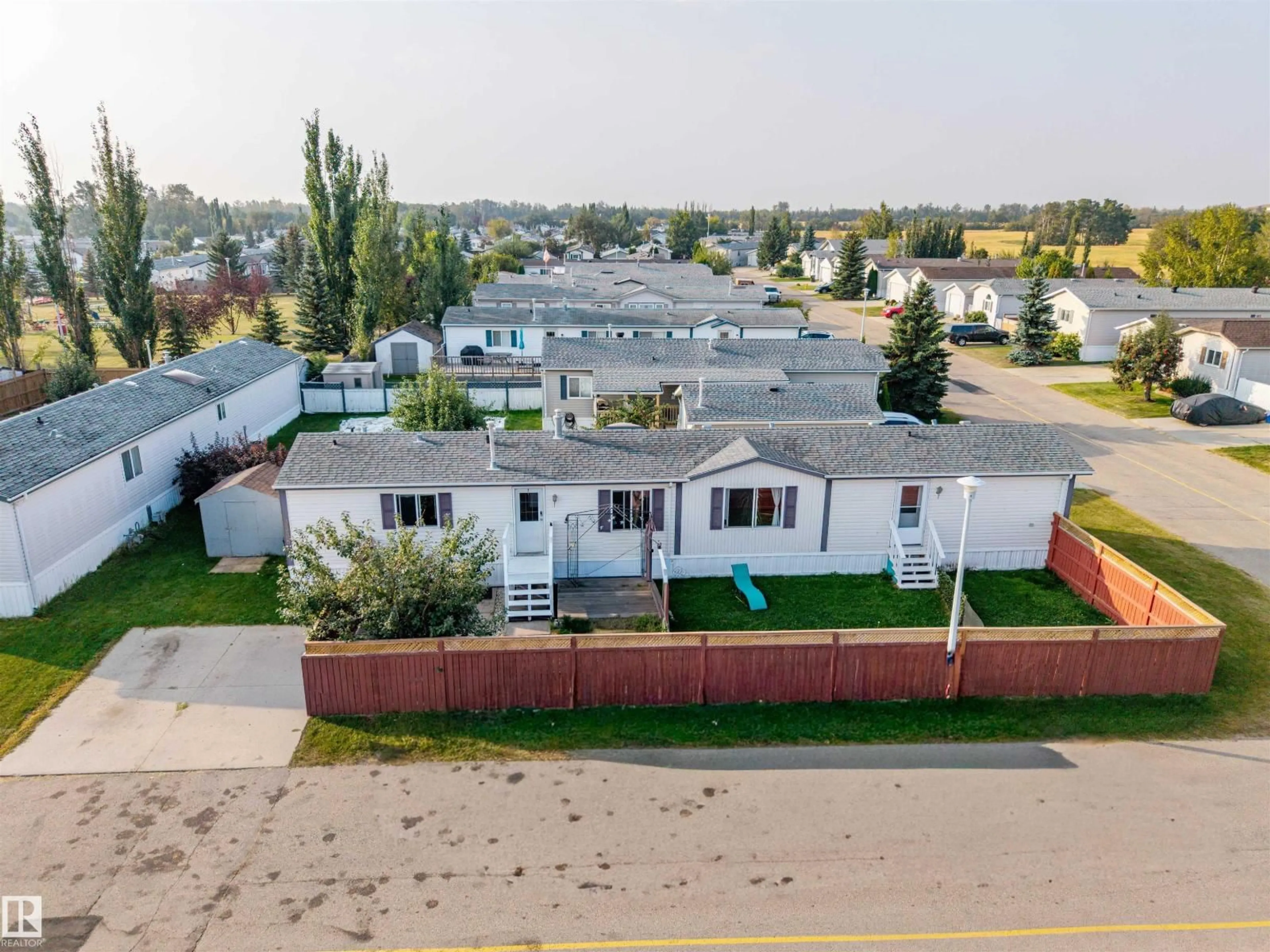 A pic from outside/outdoor area/front of a property/back of a property/a pic from drone, street for 3338 LAKEVIEW RD, Edmonton Alberta T5S2R8