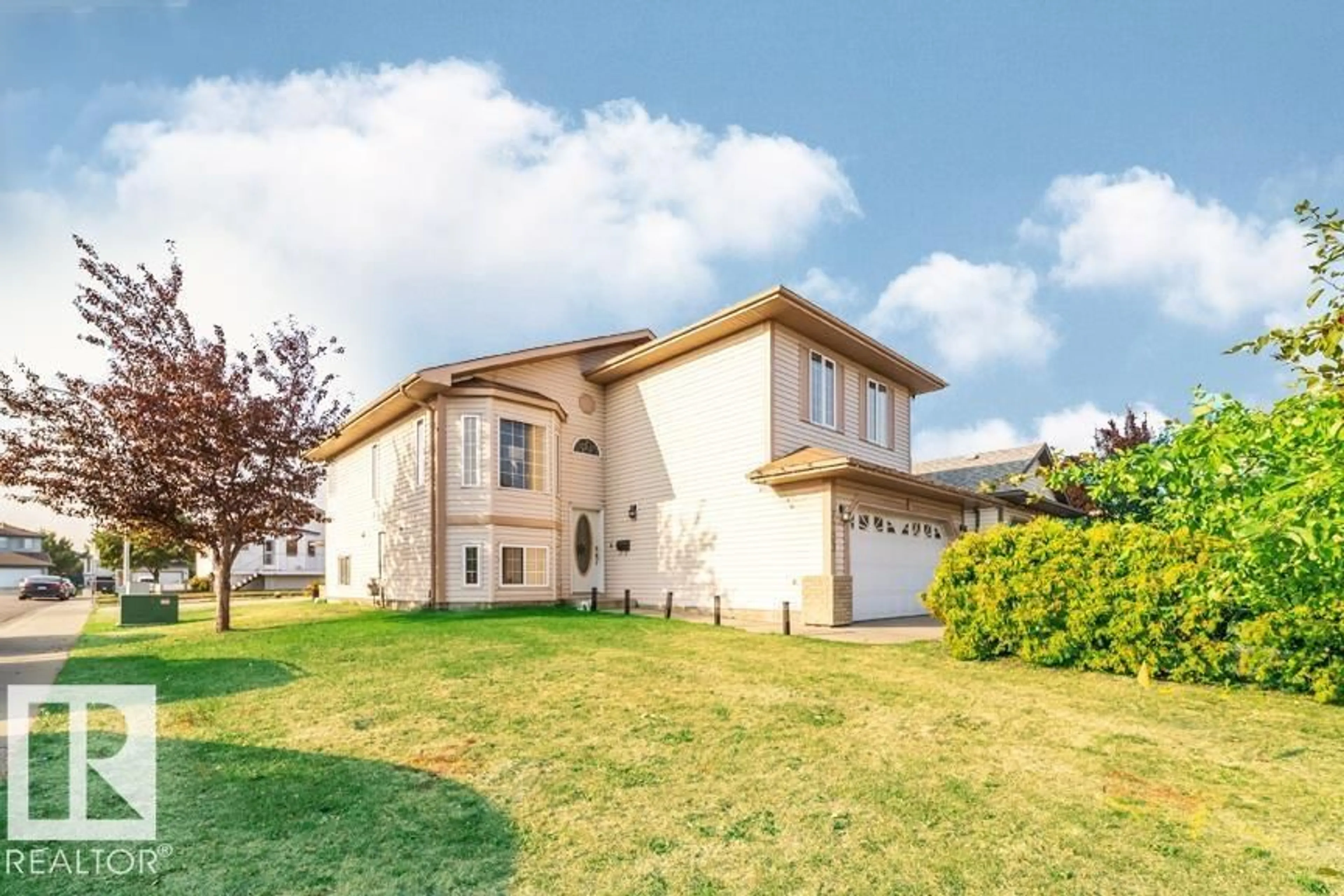 Home with vinyl exterior material, unknown for 6703 165 AV, Edmonton Alberta T5Y3L5