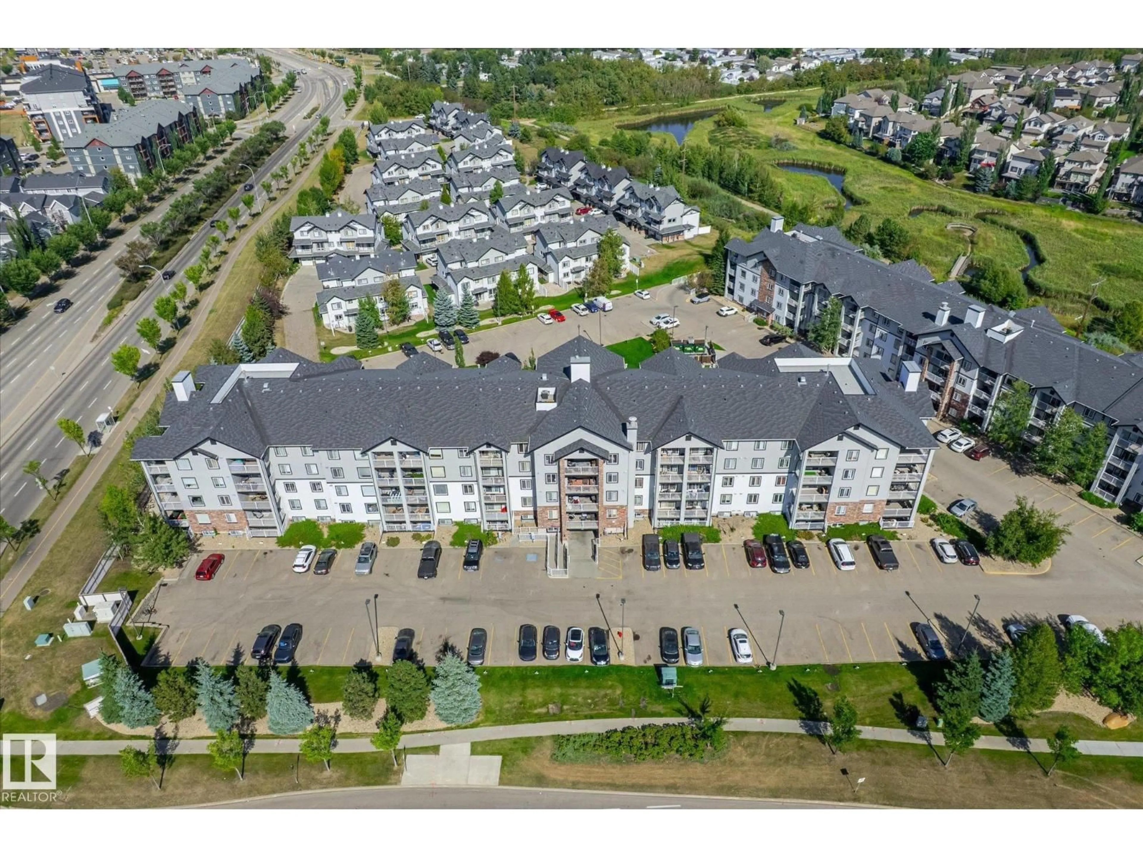 A pic from outside/outdoor area/front of a property/back of a property/a pic from drone, unknown for #111 - 111 SUMMERWOOD BV, Sherwood Park Alberta T8H0C3
